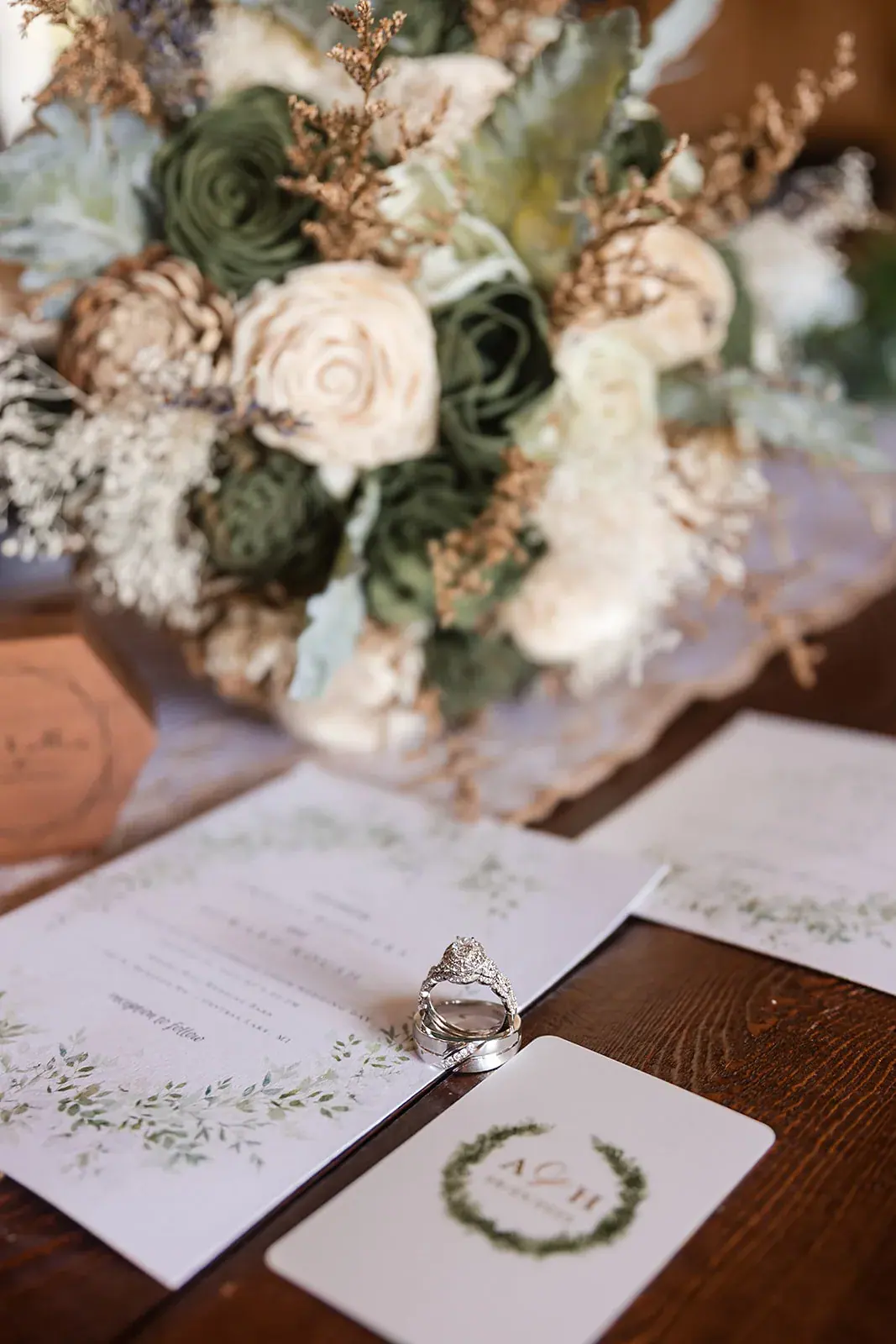 Bouquet invitation detail — Amelia & Howard's wedding at Sunset Hill Wedding Barn, Central Lake