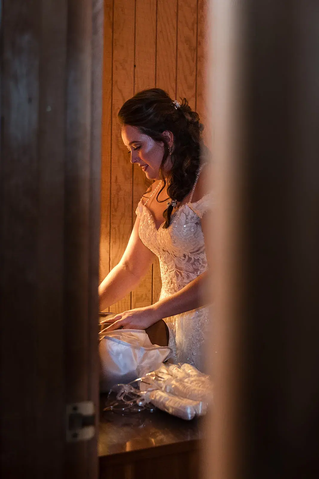 Bride getting ready window light — Amelia & Howard's wedding at Sunset Hill Wedding Barn, Central Lake