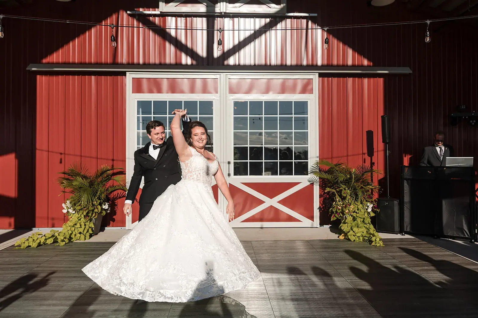 Bride and groom dancing red barn — Amelia & Howard's wedding at Sunset Hill Wedding Barn, Central Lake