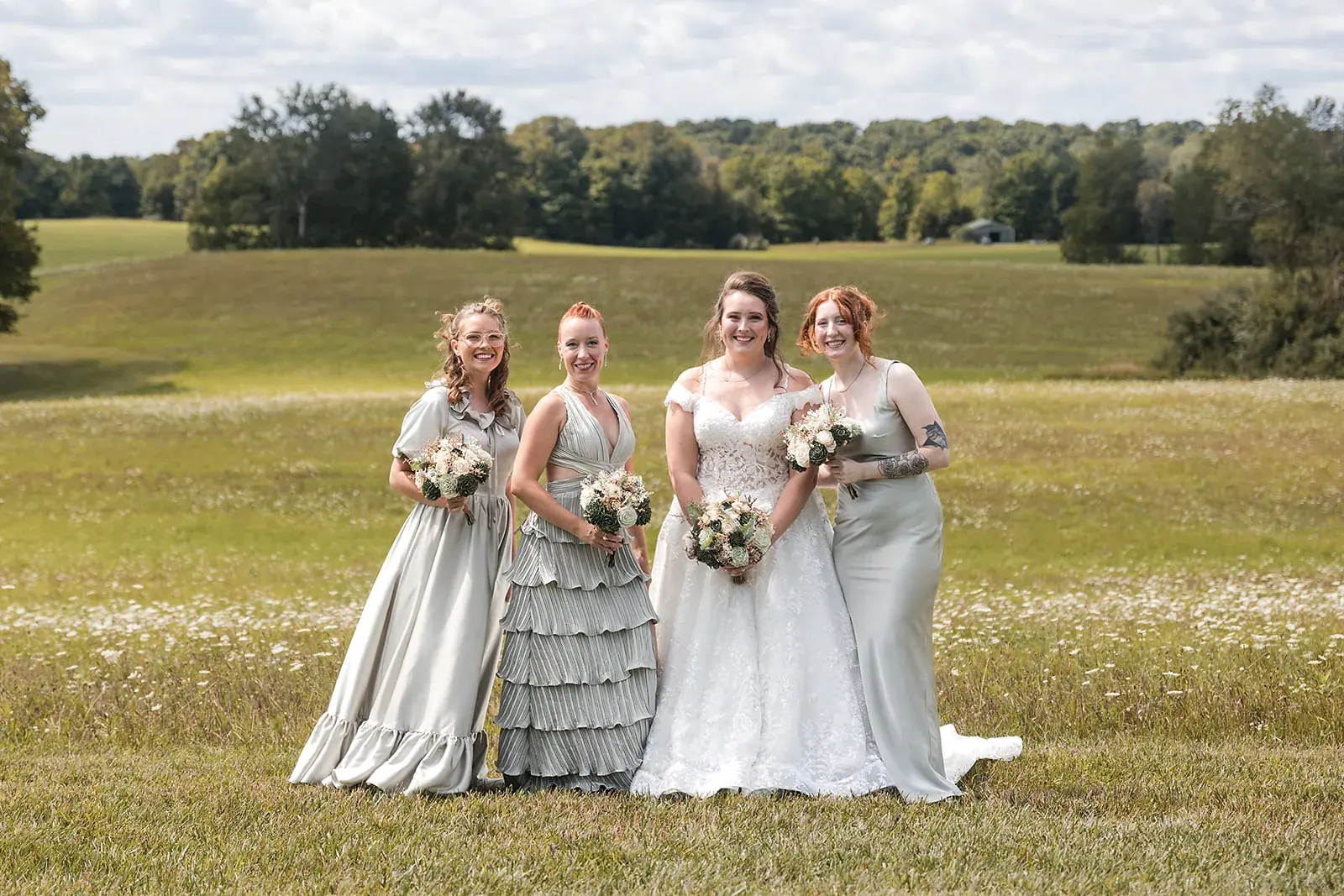 Bride with bridesmaids field — Amelia & Howard's wedding at Sunset Hill Wedding Barn, Central Lake