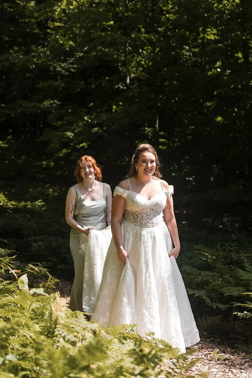 Bride with maid of honor woods — Amelia & Howard's wedding at Sunset Hill Wedding Barn, Central Lake