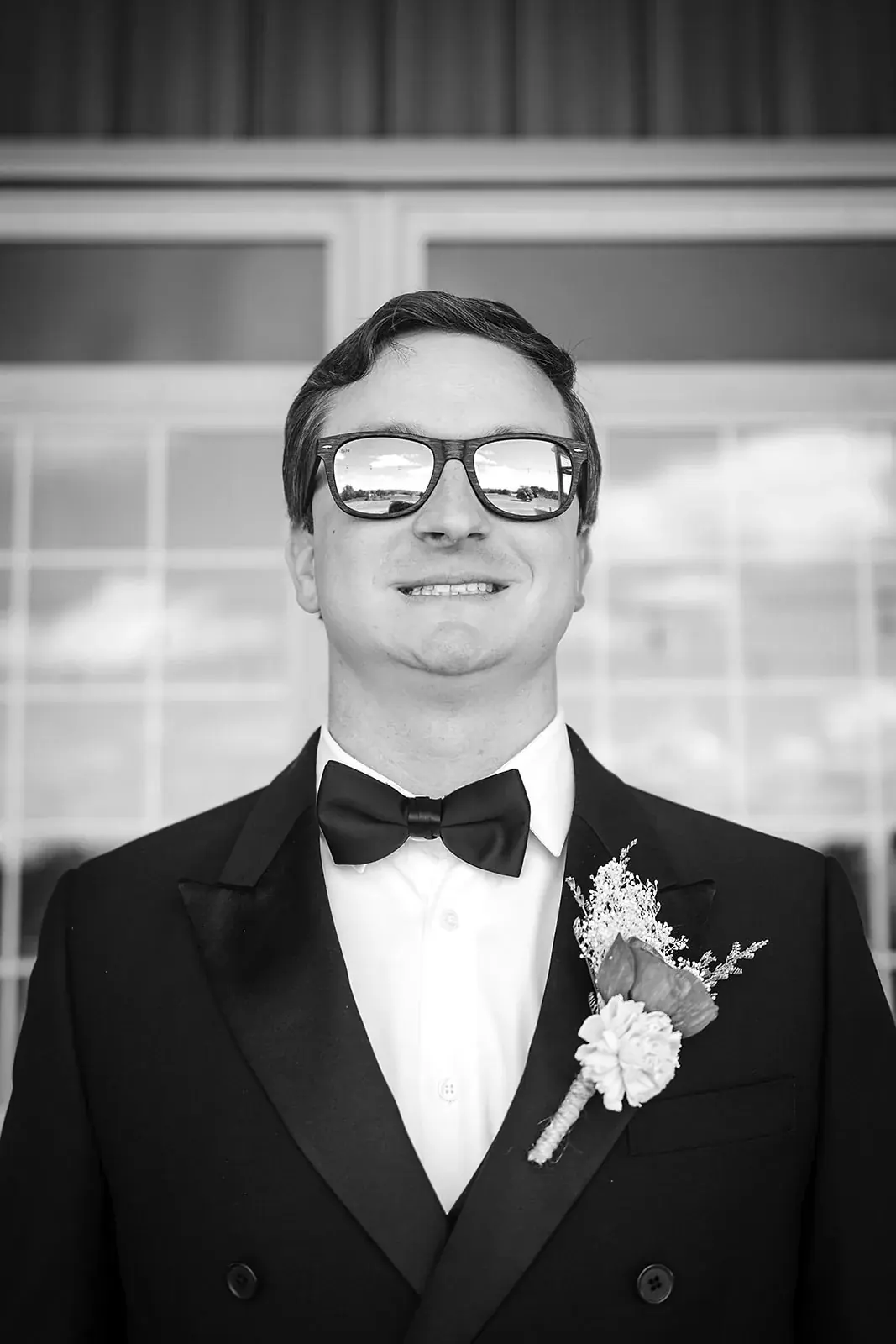 Groom sunglasses in black and white — Amelia & Howard's wedding at Sunset Hill Wedding Barn, Central Lake