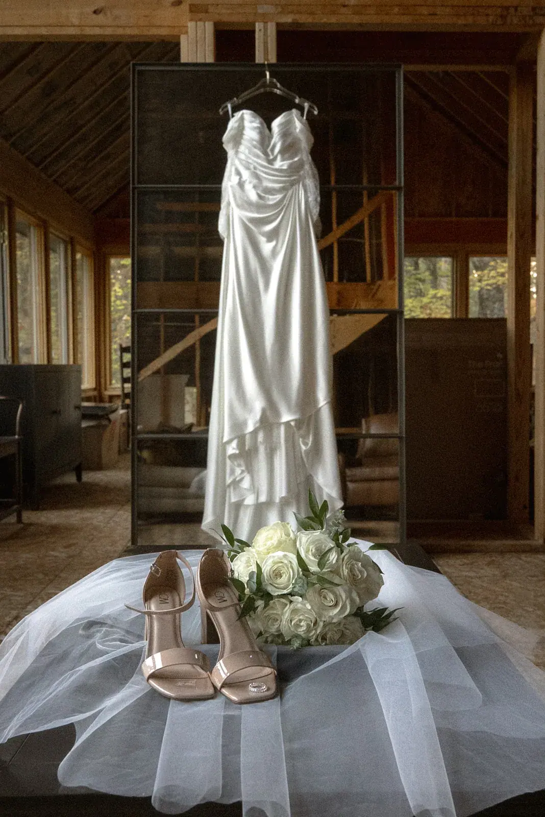 Wedding dress hanging log home — Ann & Brad's wedding at their log home in Vanderbilt