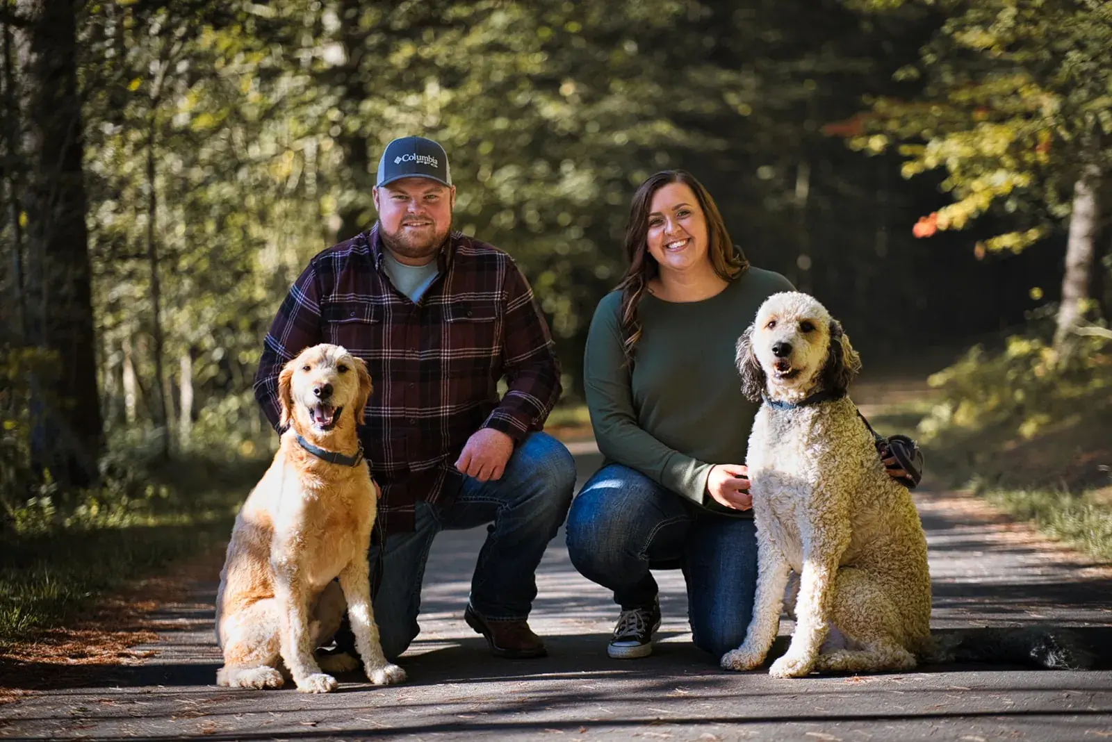 Couple with two dogs trail — Chelsea & Jake's engagement session at Aspen Park, Gaylord