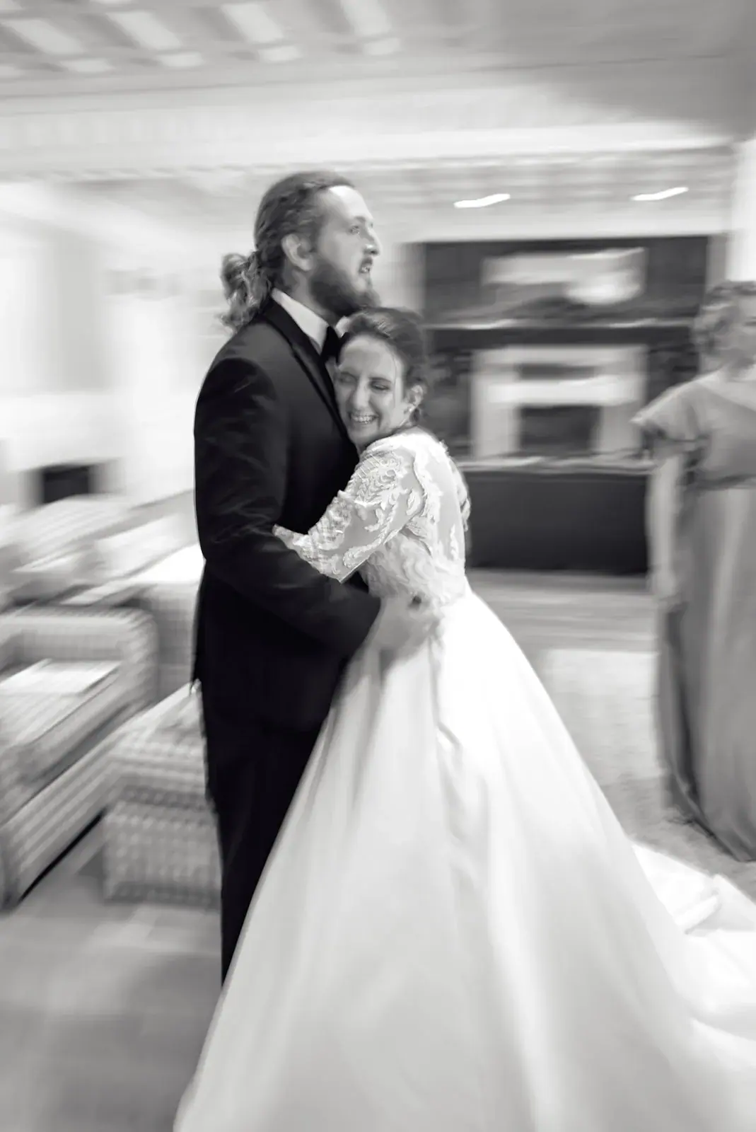 Bride and groom embrace in black and white — Claire & Nick's wedding at Howe Marine, Indian River