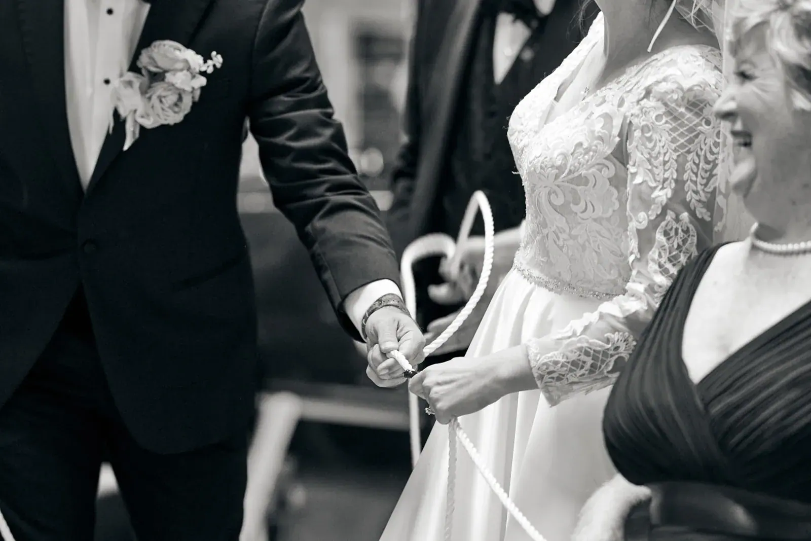 Bride and groom hands in black and white — Claire & Nick's wedding at Howe Marine, Indian River