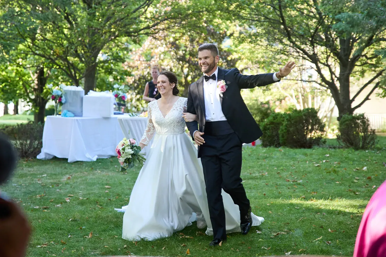 Bride and groom recessional lawn — Claire & Nick's wedding at Howe Marine, Indian River