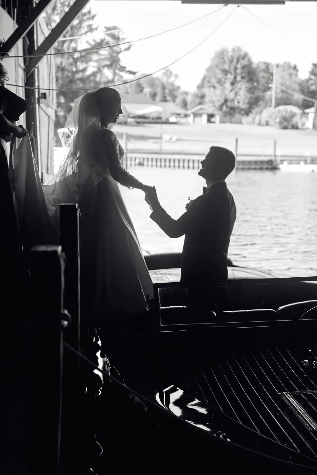 Bride and groom silhouette boathouse — Claire & Nick's wedding at Howe Marine, Indian River