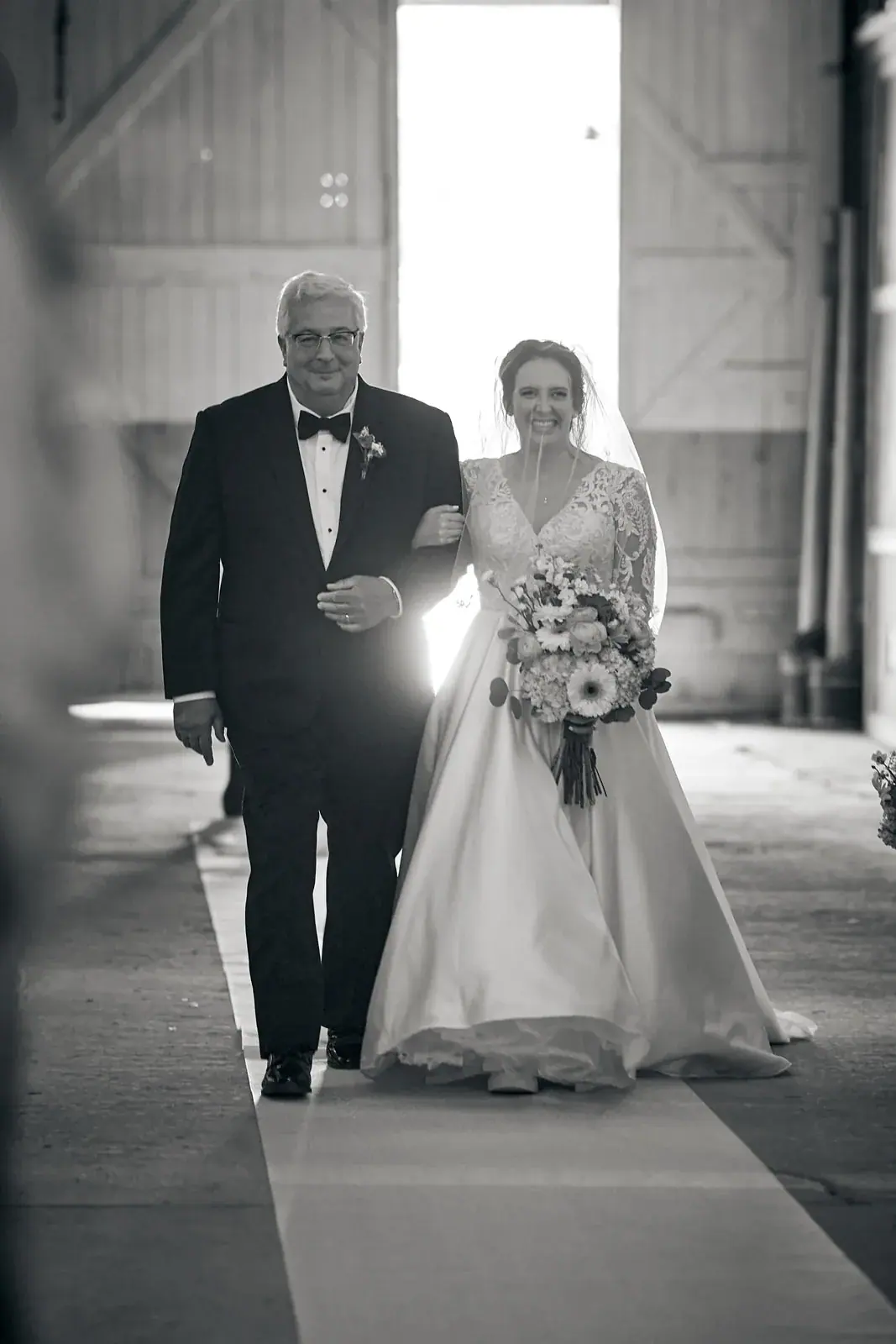 Father escorting bride in black and white — Claire & Nick's wedding at Howe Marine, Indian River