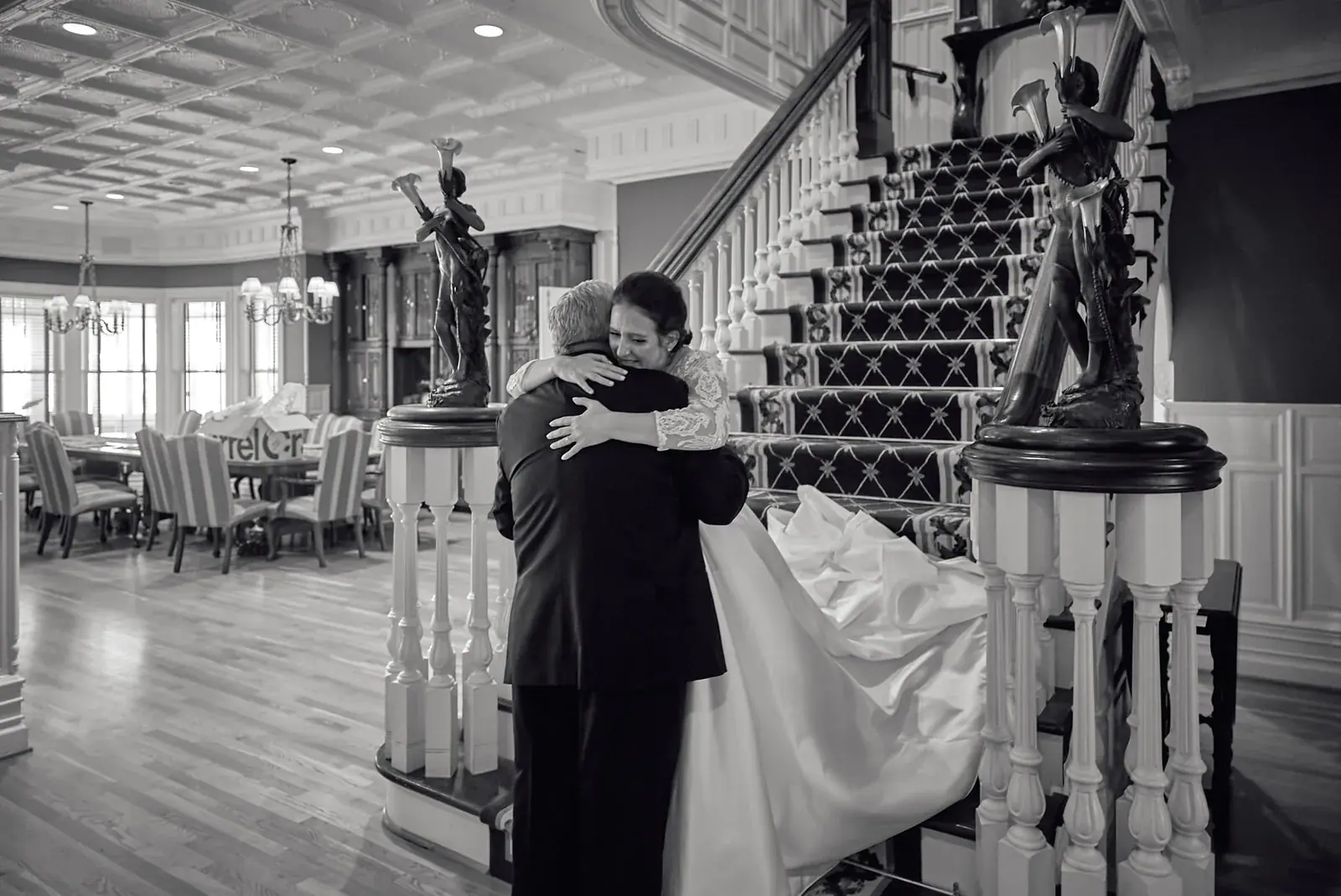 First look staircase in black and white — Claire & Nick's wedding at Howe Marine, Indian River