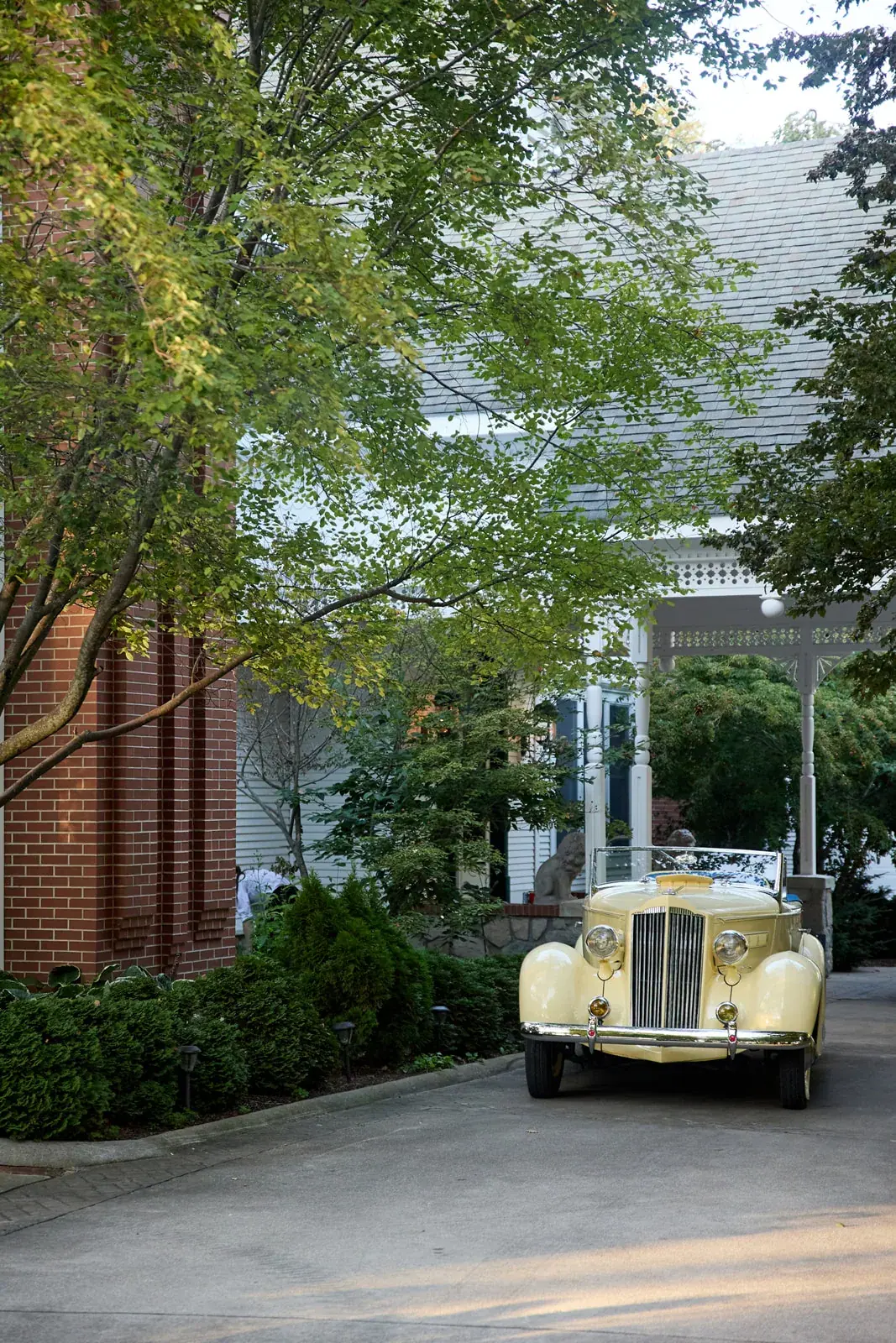 Vintage car tree lined drive — Claire & Nick's wedding at Howe Marine, Indian River