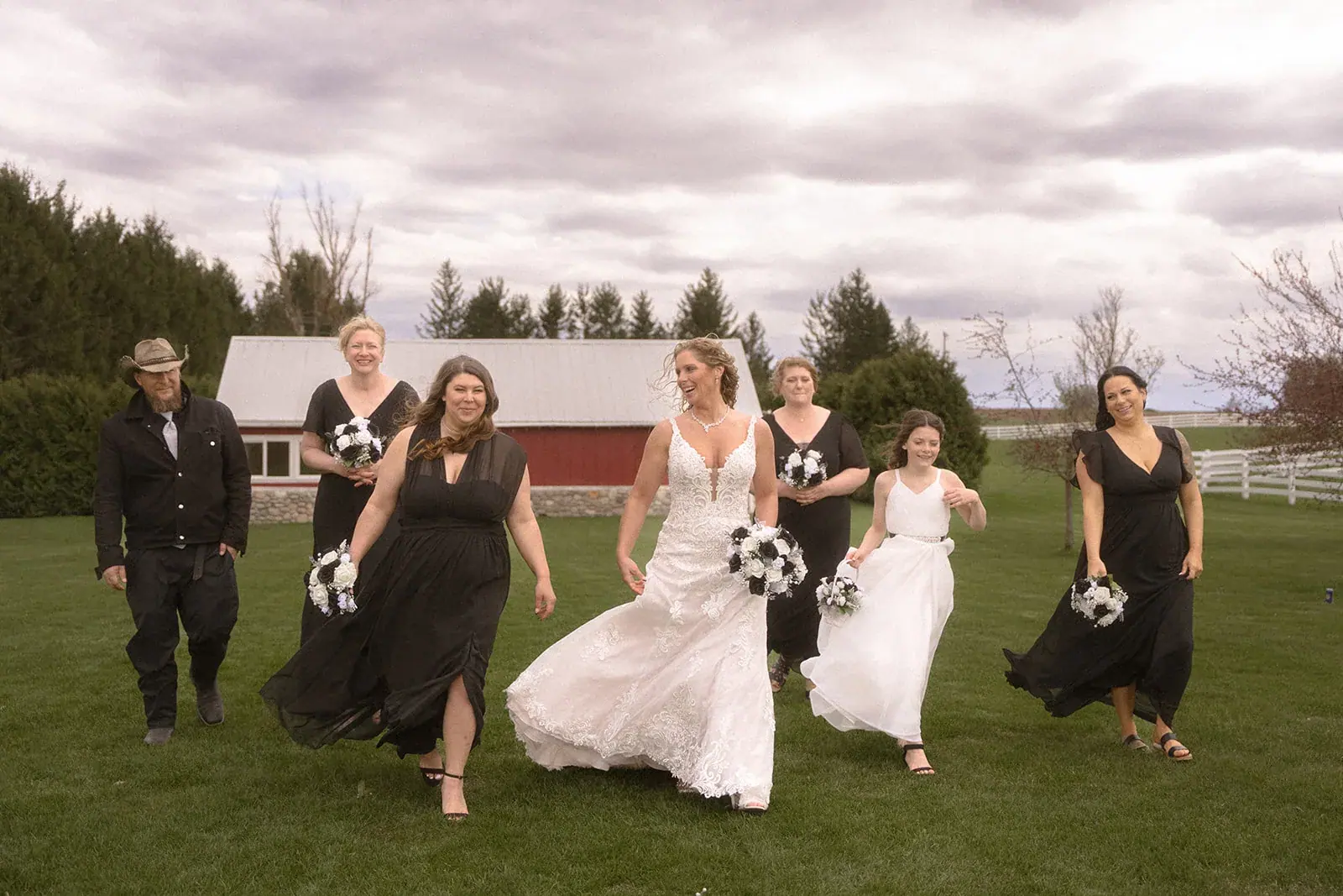 Bride bridesmaids walking — Erin & Jim's wedding at Sonshine Barn, Gaylord