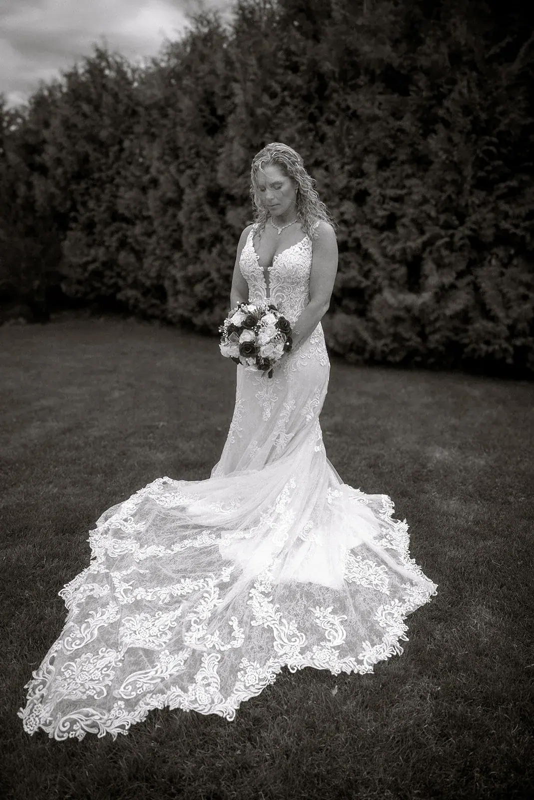 Bride lace train in black and white — Erin & Jim's wedding at Sonshine Barn, Gaylord