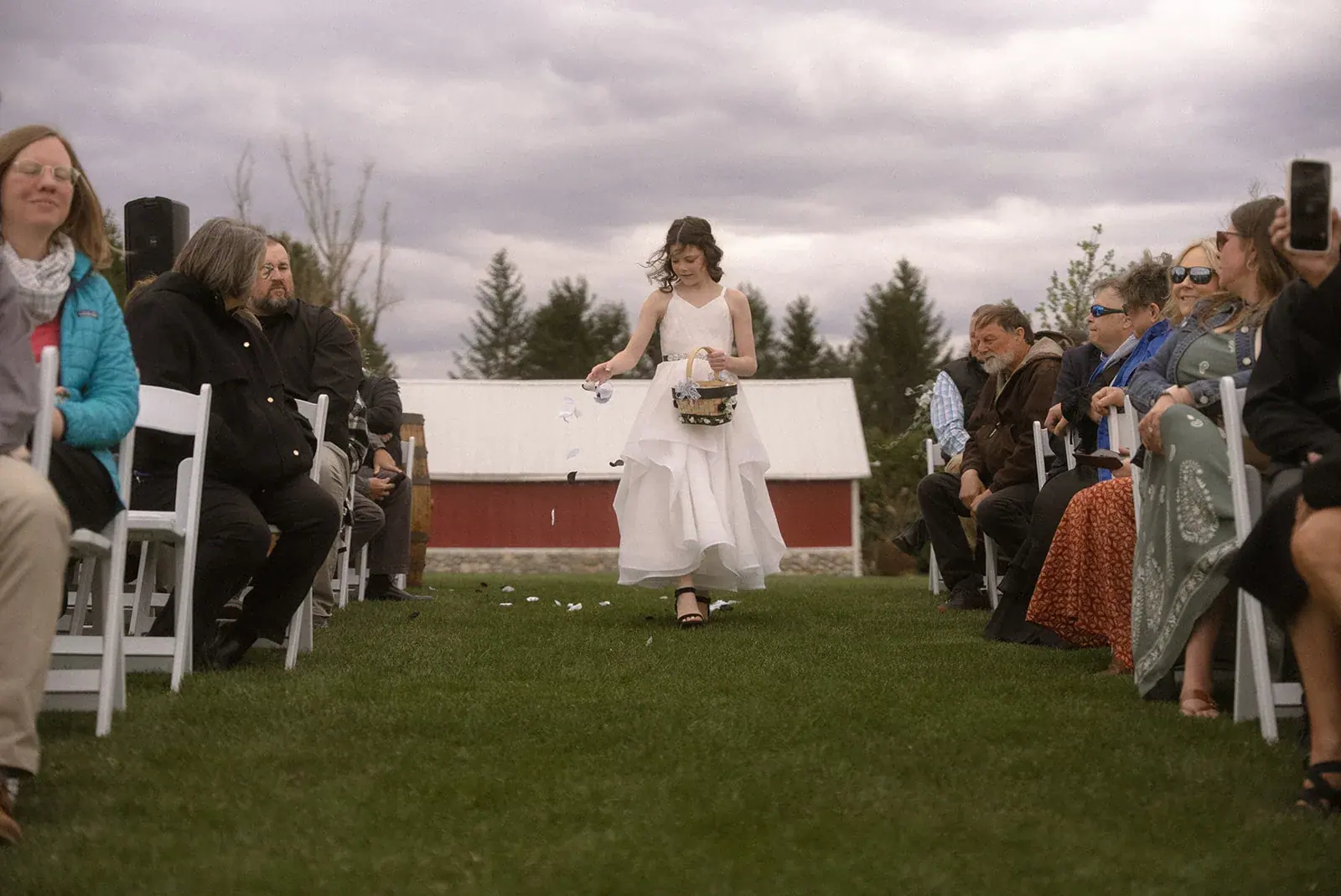 Bride walking down aisle red barn — Erin & Jim's wedding at Sonshine Barn, Gaylord