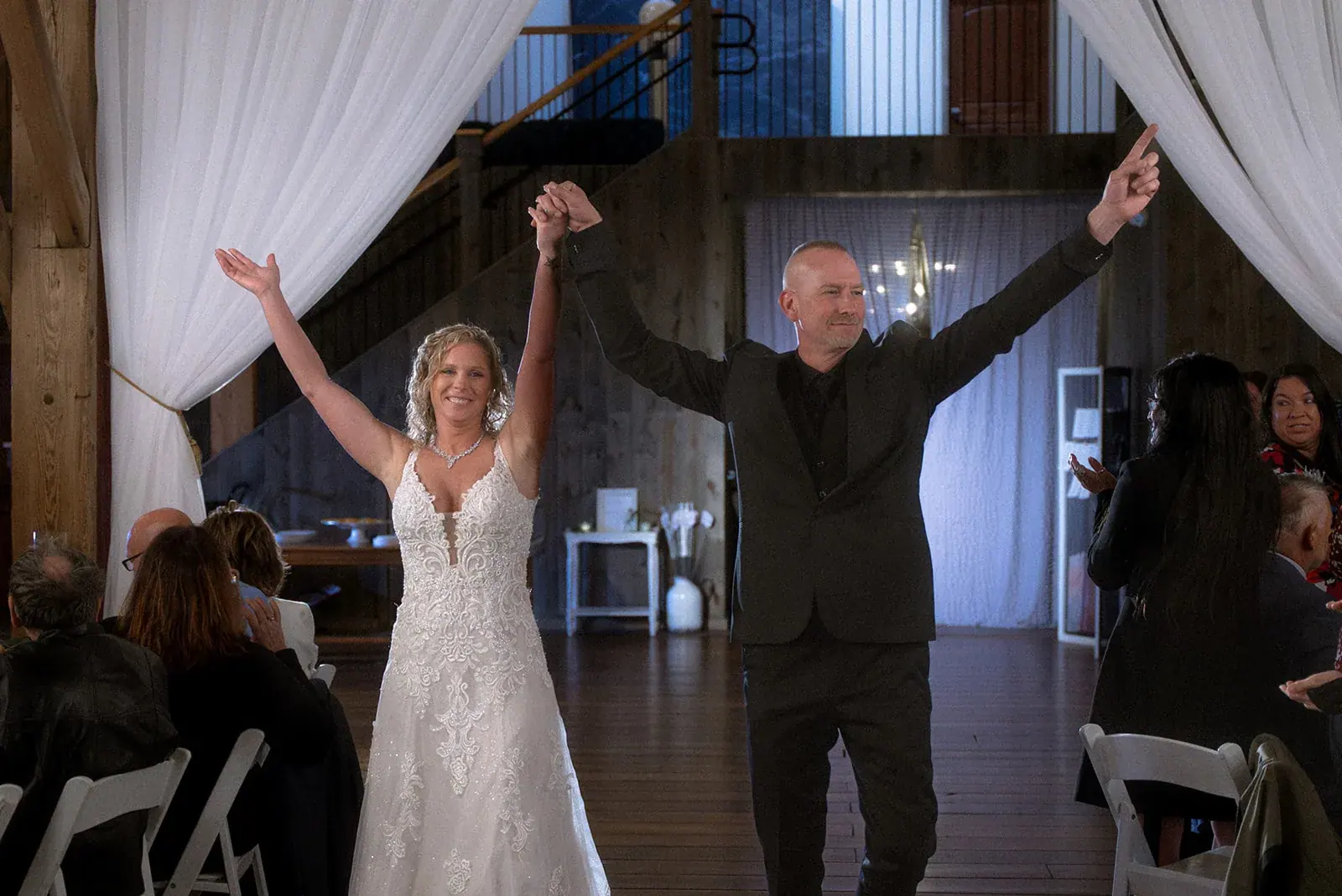 Grand entrance reception — Erin & Jim's wedding at Sonshine Barn, Gaylord