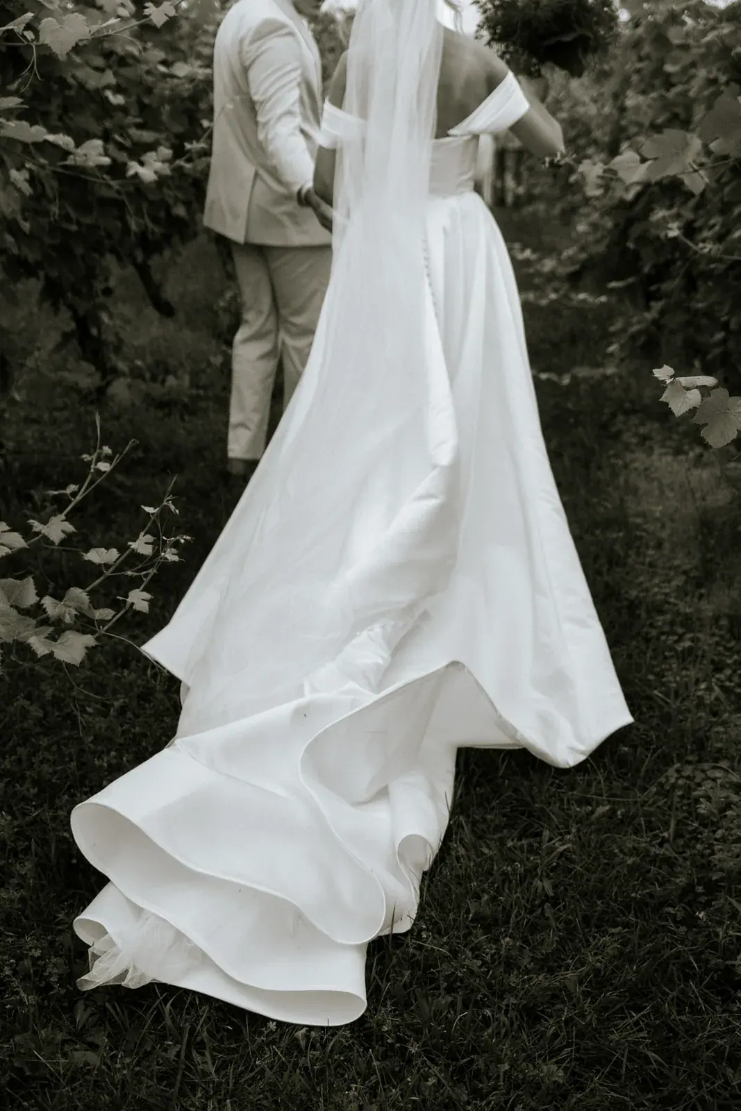 Bride dress walking in black and white — Heather & Evan's wedding at Black Star Farms