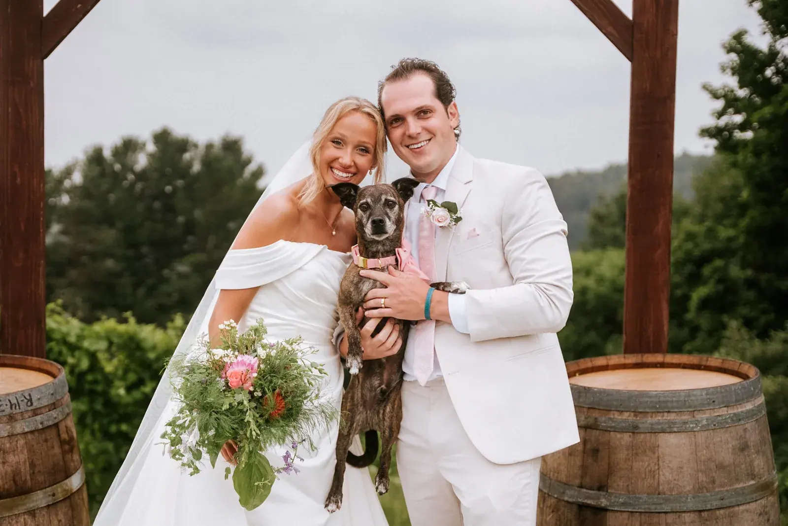 Bride and groom dog arbor portrait — Heather & Evan's wedding at Black Star Farms