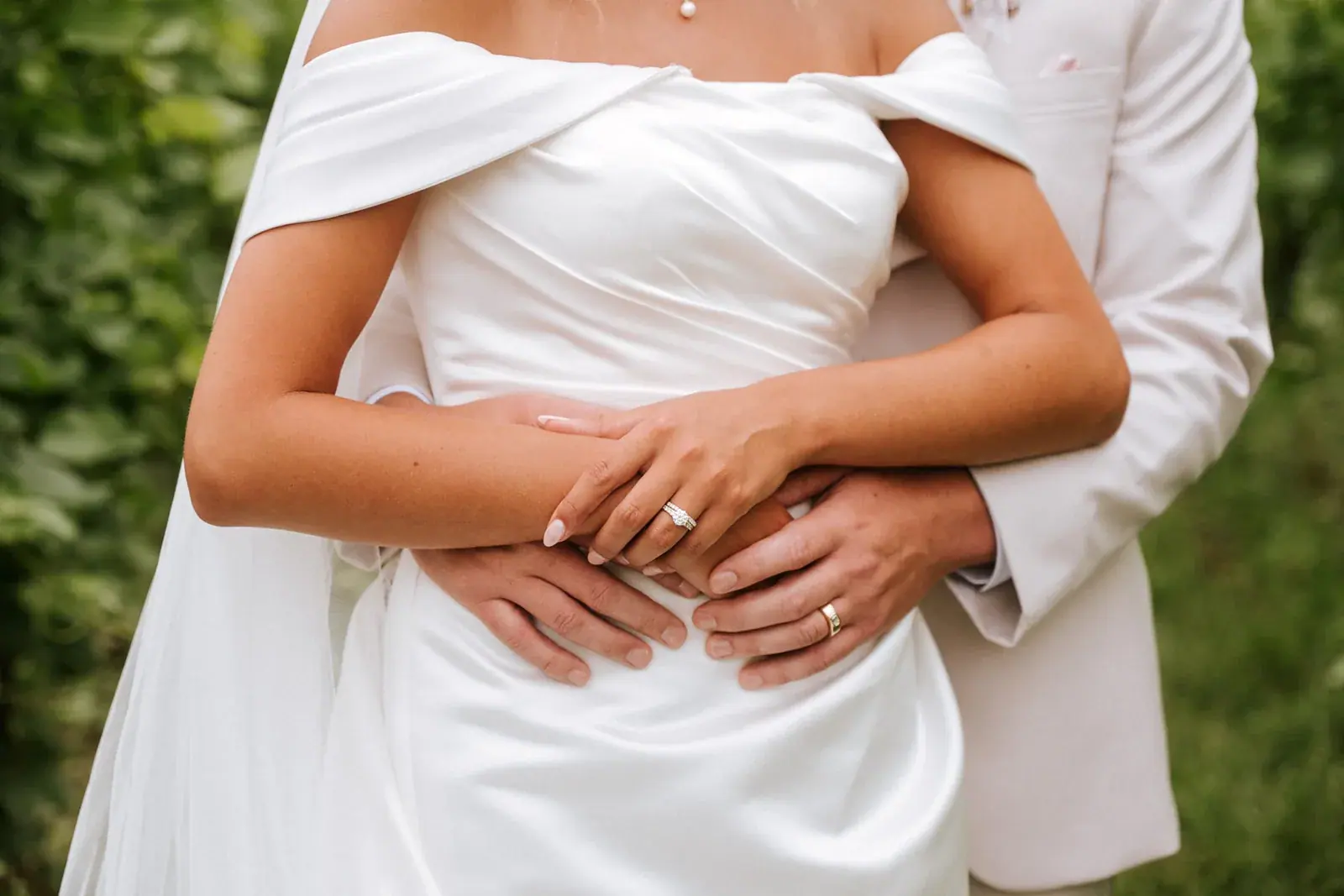 Bride and groom hands wedding ring detail — Heather & Evan's wedding at Black Star Farms
