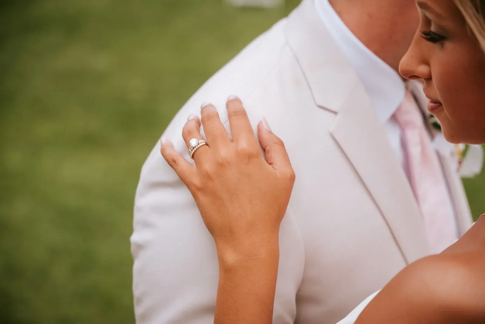 Bride hand on groom shoulder ring — Heather & Evan's wedding at Black Star Farms