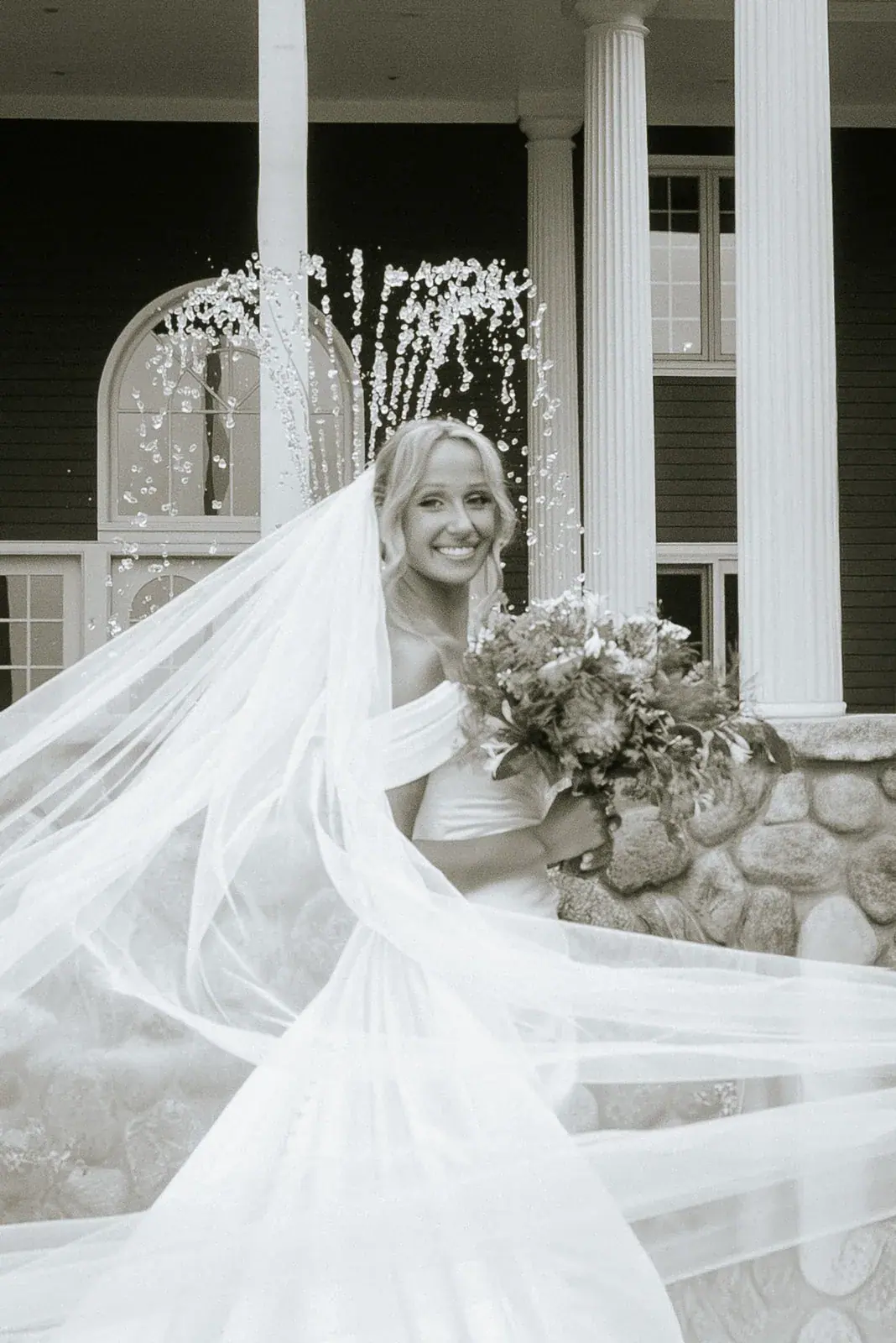 Bride veil flowing inn porch — Heather & Evan's wedding at Black Star Farms