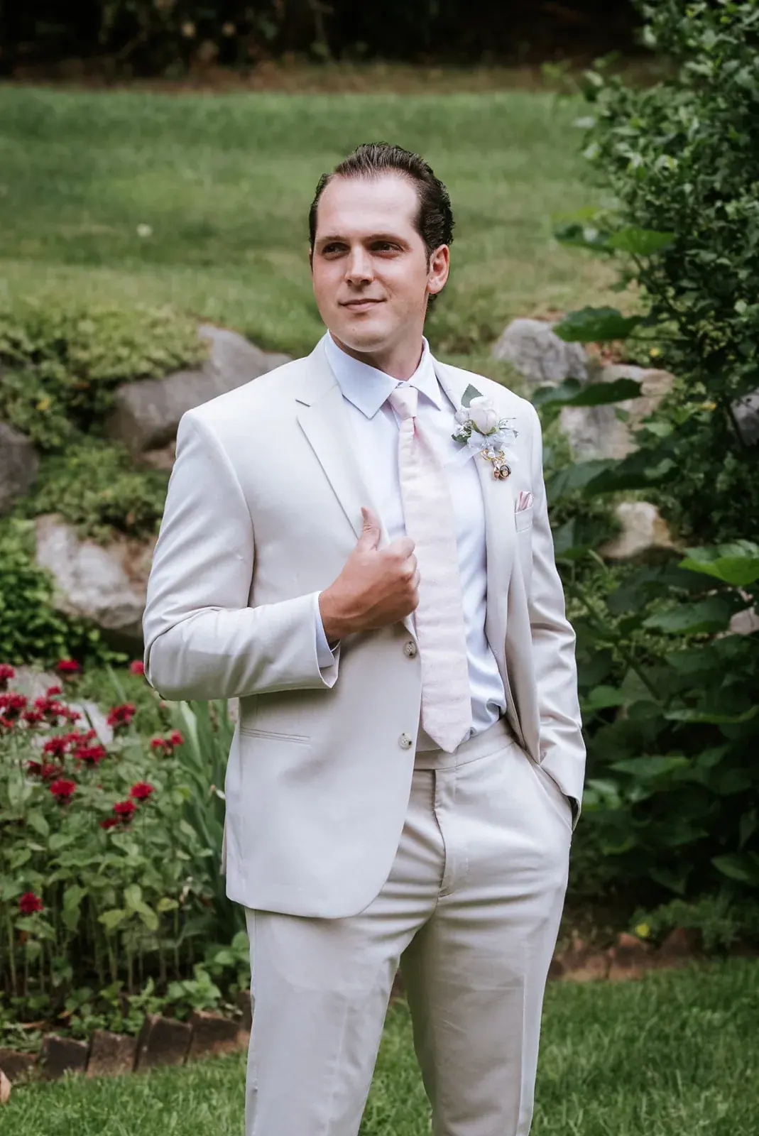 Groom portrait garden — Heather & Evan's wedding at Black Star Farms