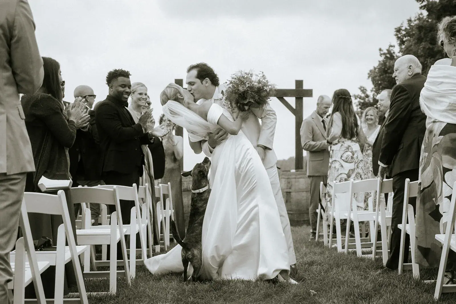 Recessional guests in black and white — Heather & Evan's wedding at Black Star Farms