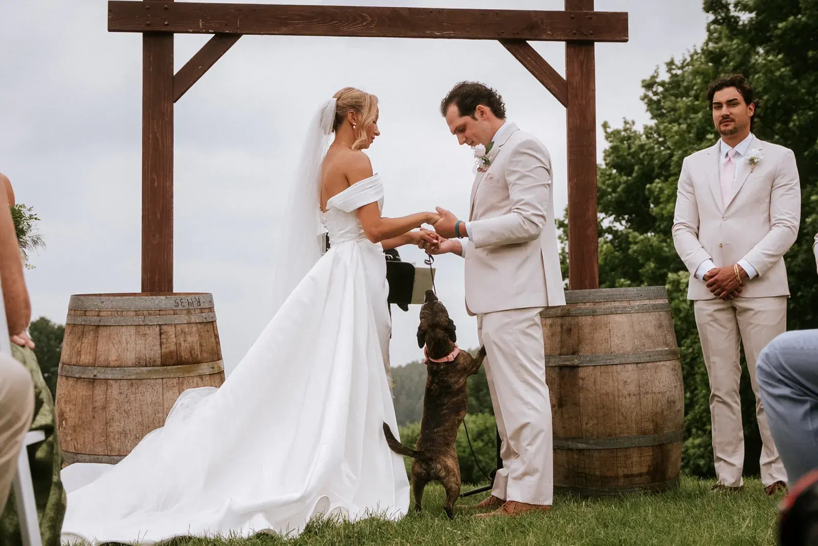Vows ceremony arbor dog — Heather & Evan's wedding at Black Star Farms