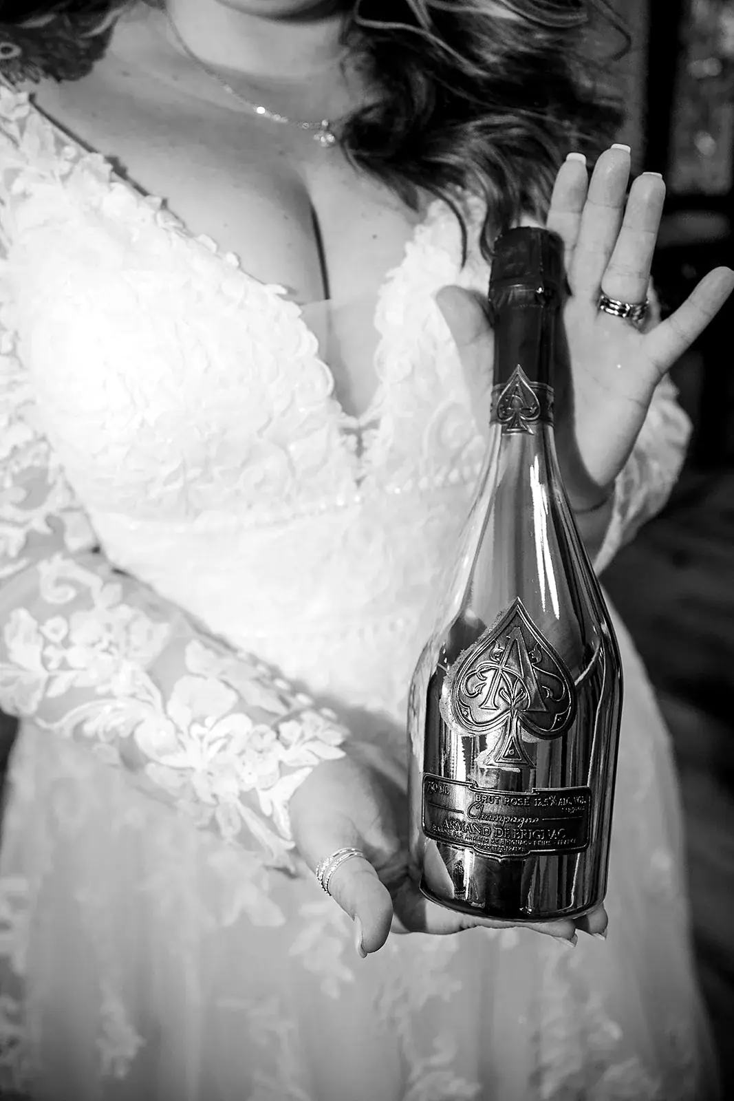 Bride champagne bottle in black and white — Heather & Jason's wedding at The Manor at Fire Tower Hill, Lewiston