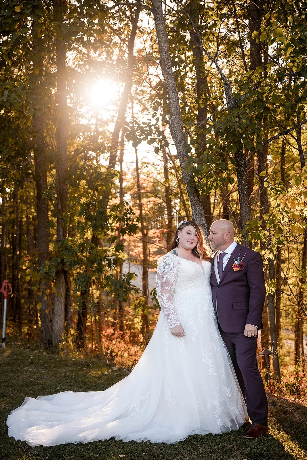 Bride and groom backlit fall woods — Heather & Jason's wedding at The Manor at Fire Tower Hill, Lewiston
