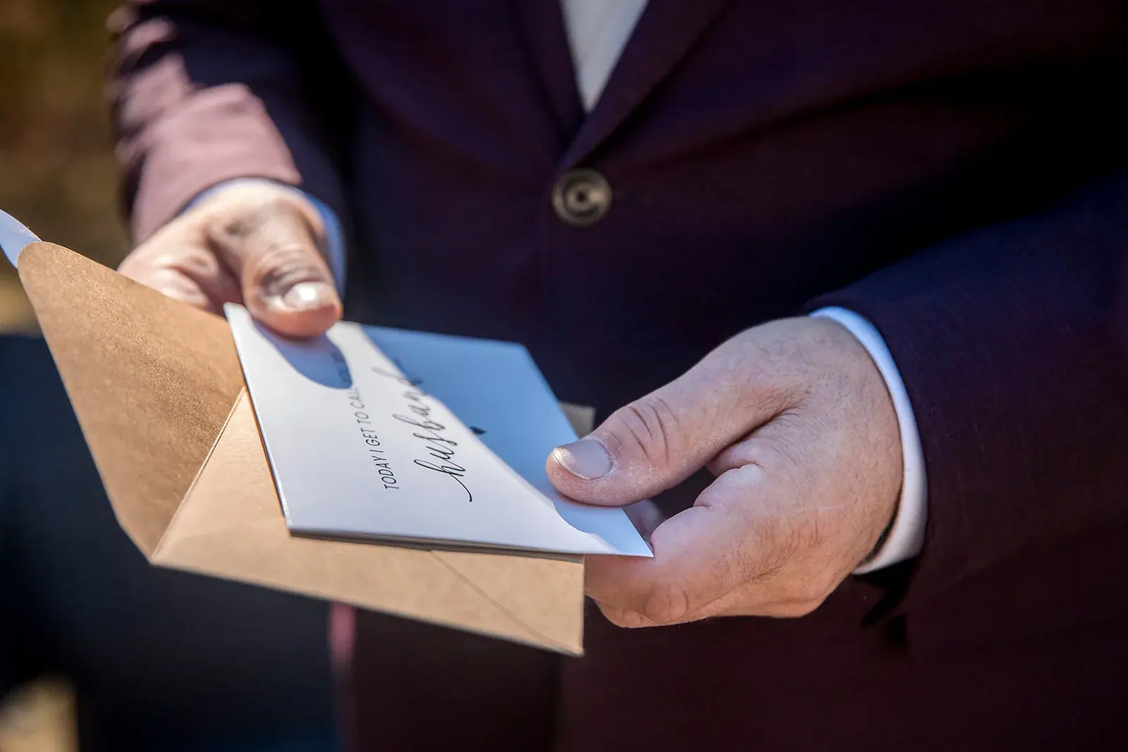 Groom opening card detail — Heather & Jason's wedding at The Manor at Fire Tower Hill, Lewiston