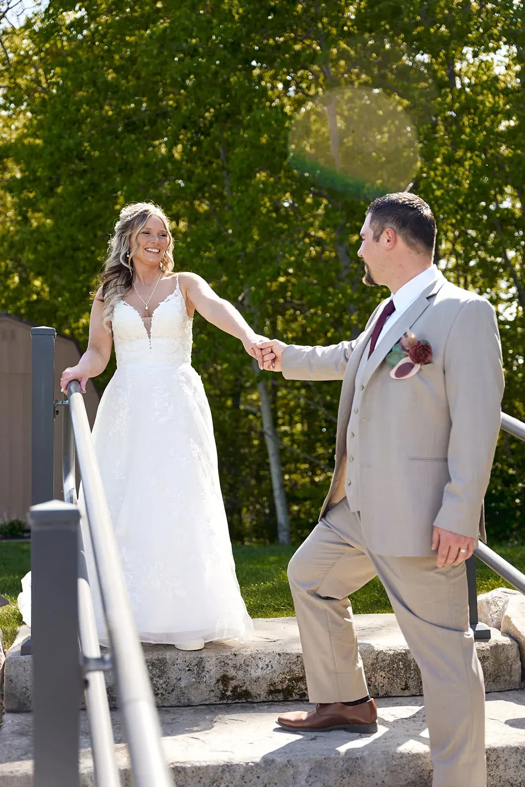 Bride and groom stone steps — Jess & Bryce's wedding at The Manor at Fire Tower Hill, Lewiston
