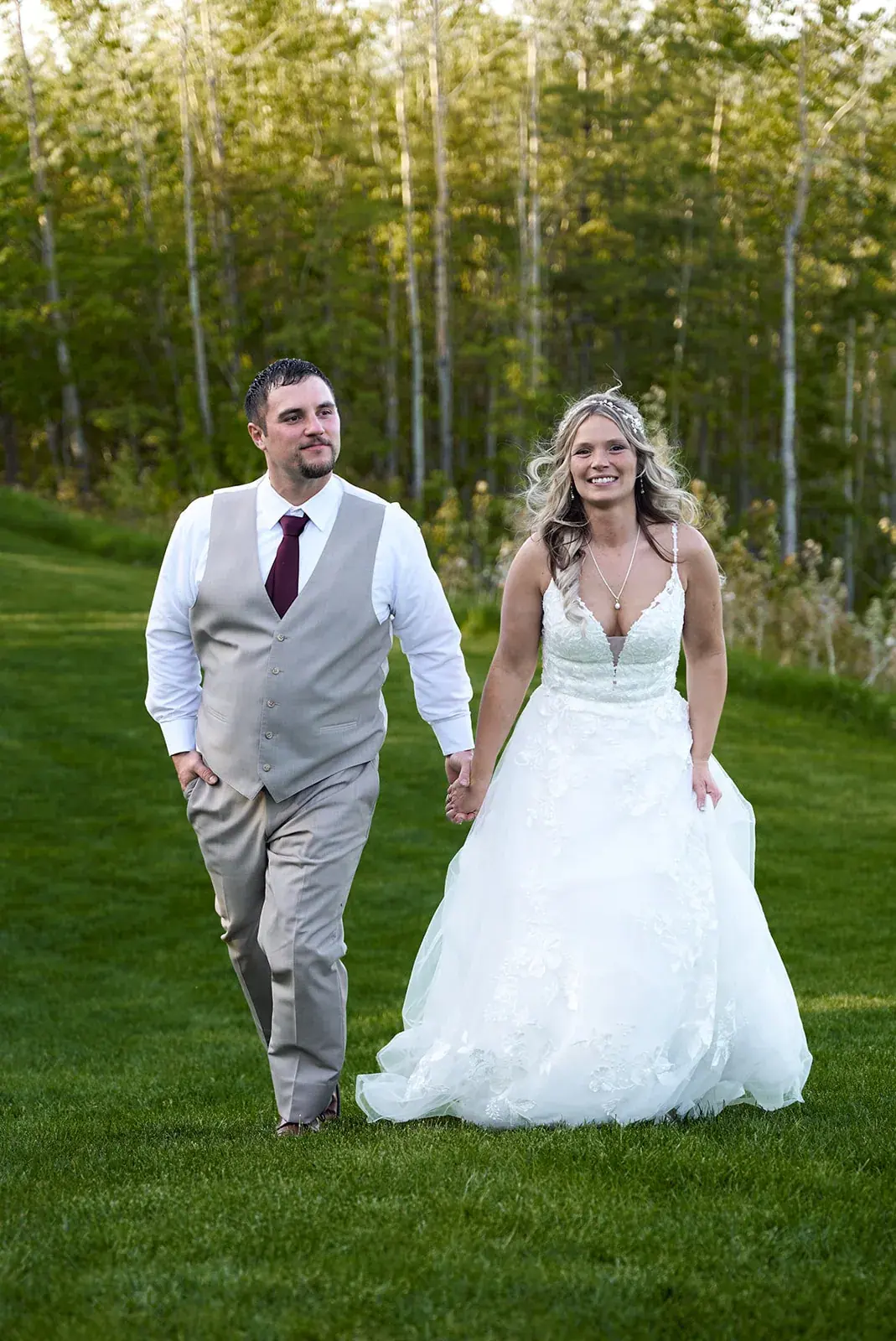 Bride and groom walking together — Jess & Bryce's wedding at The Manor at Fire Tower Hill, Lewiston