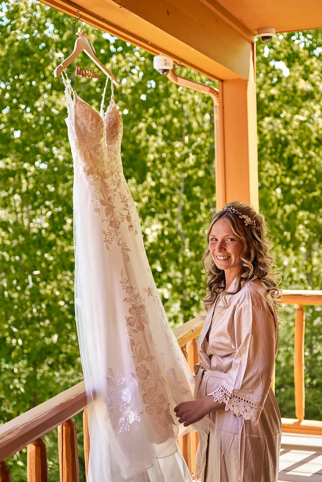 Bride looking at dress porch — Jess & Bryce's wedding at The Manor at Fire Tower Hill, Lewiston