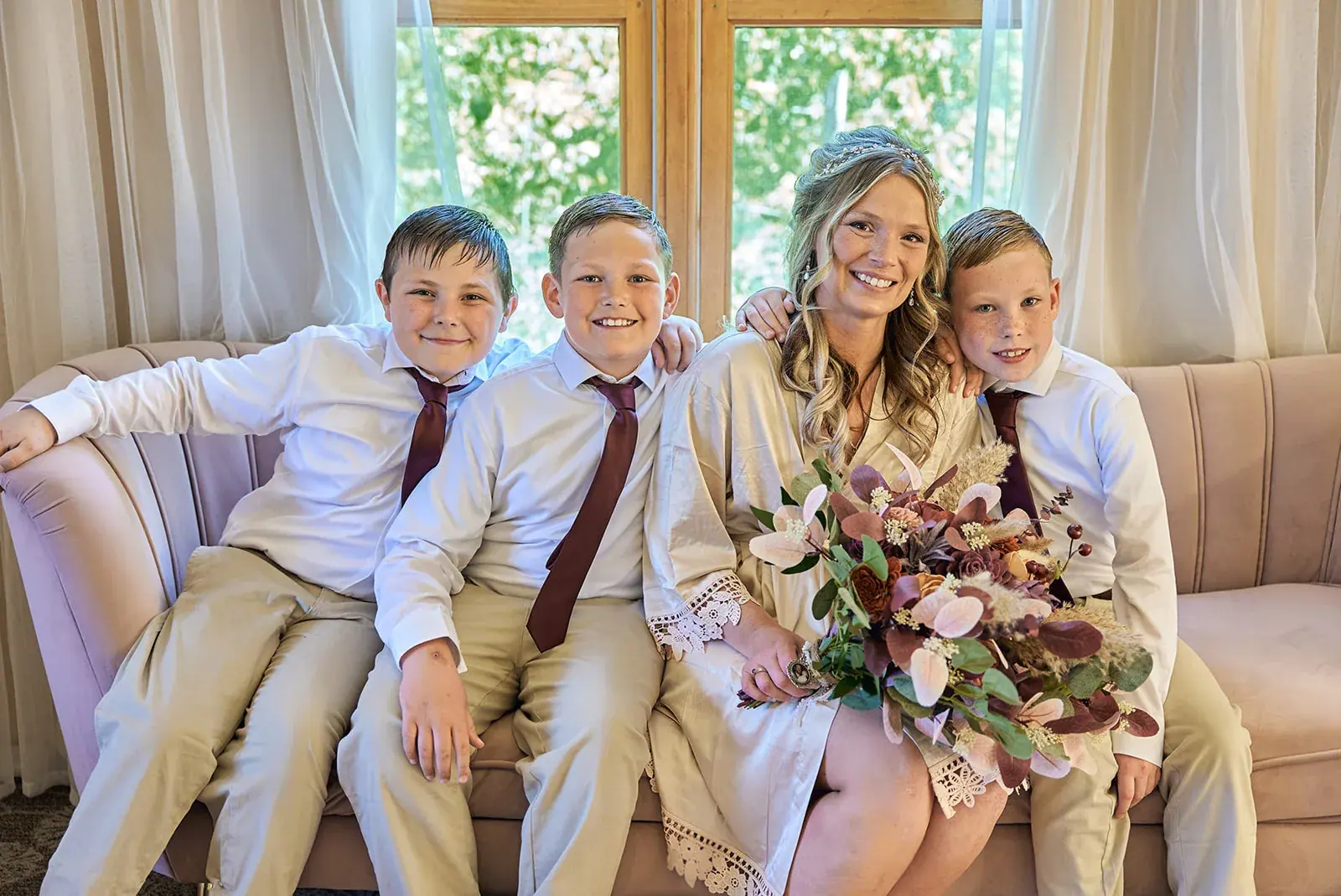 Bride ring bearers sofa — Jess & Bryce's wedding at The Manor at Fire Tower Hill, Lewiston
