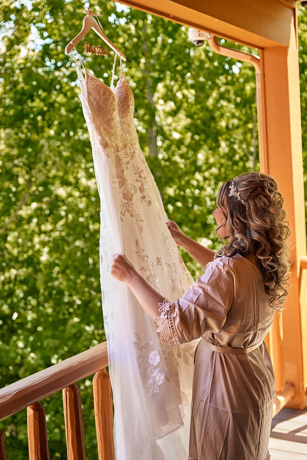 Bride wedding dress porch — Jess & Bryce's wedding at The Manor at Fire Tower Hill, Lewiston