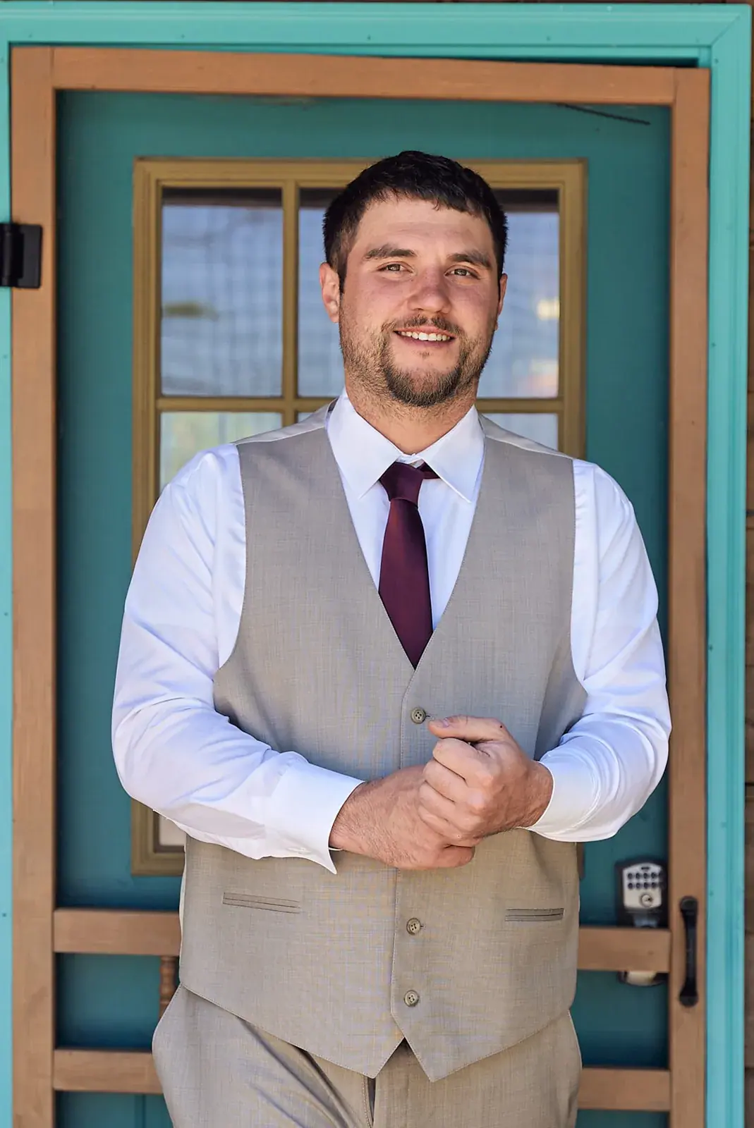 Groom portrait teal door — Jess & Bryce's wedding at The Manor at Fire Tower Hill, Lewiston