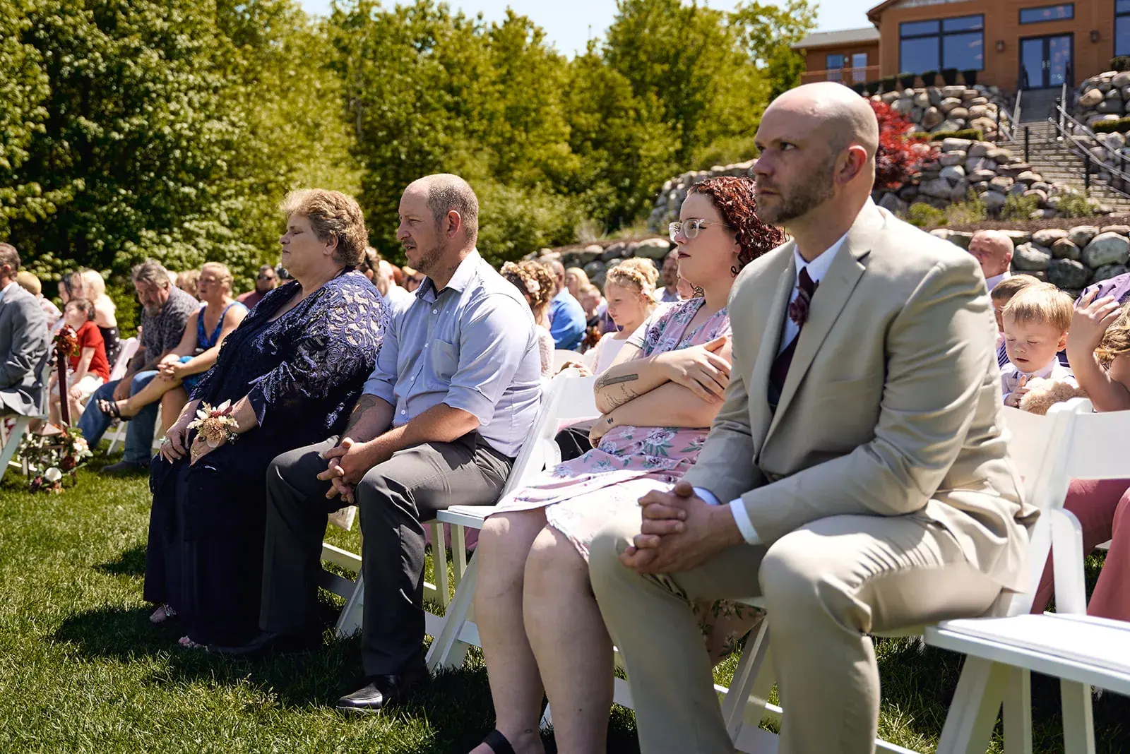 Guests ceremony candid — Jess & Bryce's wedding at The Manor at Fire Tower Hill, Lewiston