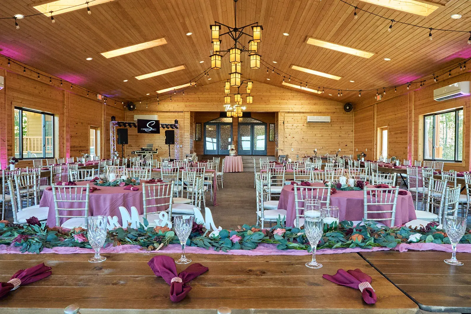 Lodge reception hall wide — Jess & Bryce's wedding at The Manor at Fire Tower Hill, Lewiston