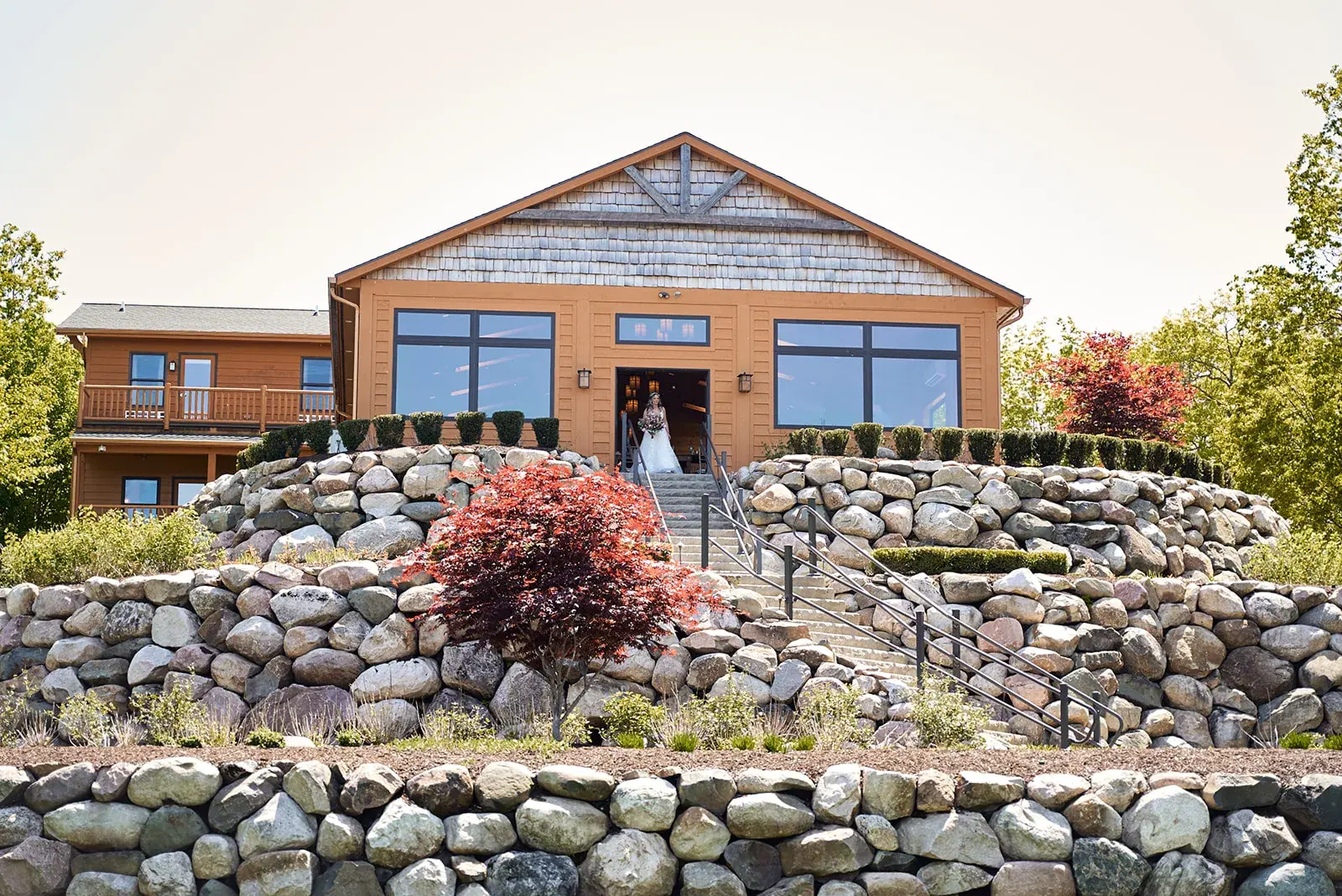 Manor fire tower hill lodge exterior — Jess & Bryce's wedding at The Manor at Fire Tower Hill, Lewiston