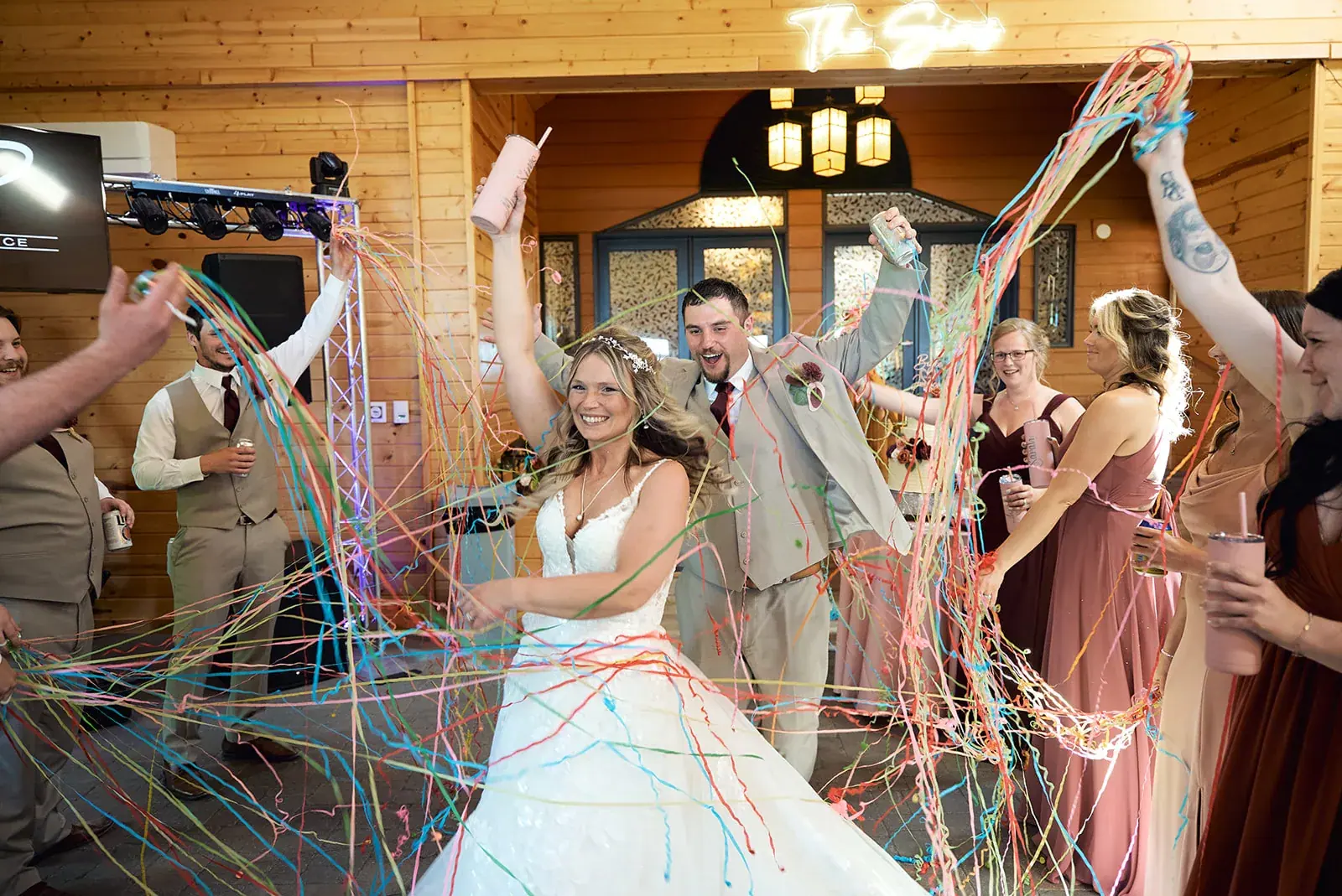 Reception bubbles celebration — Jess & Bryce's wedding at The Manor at Fire Tower Hill, Lewiston