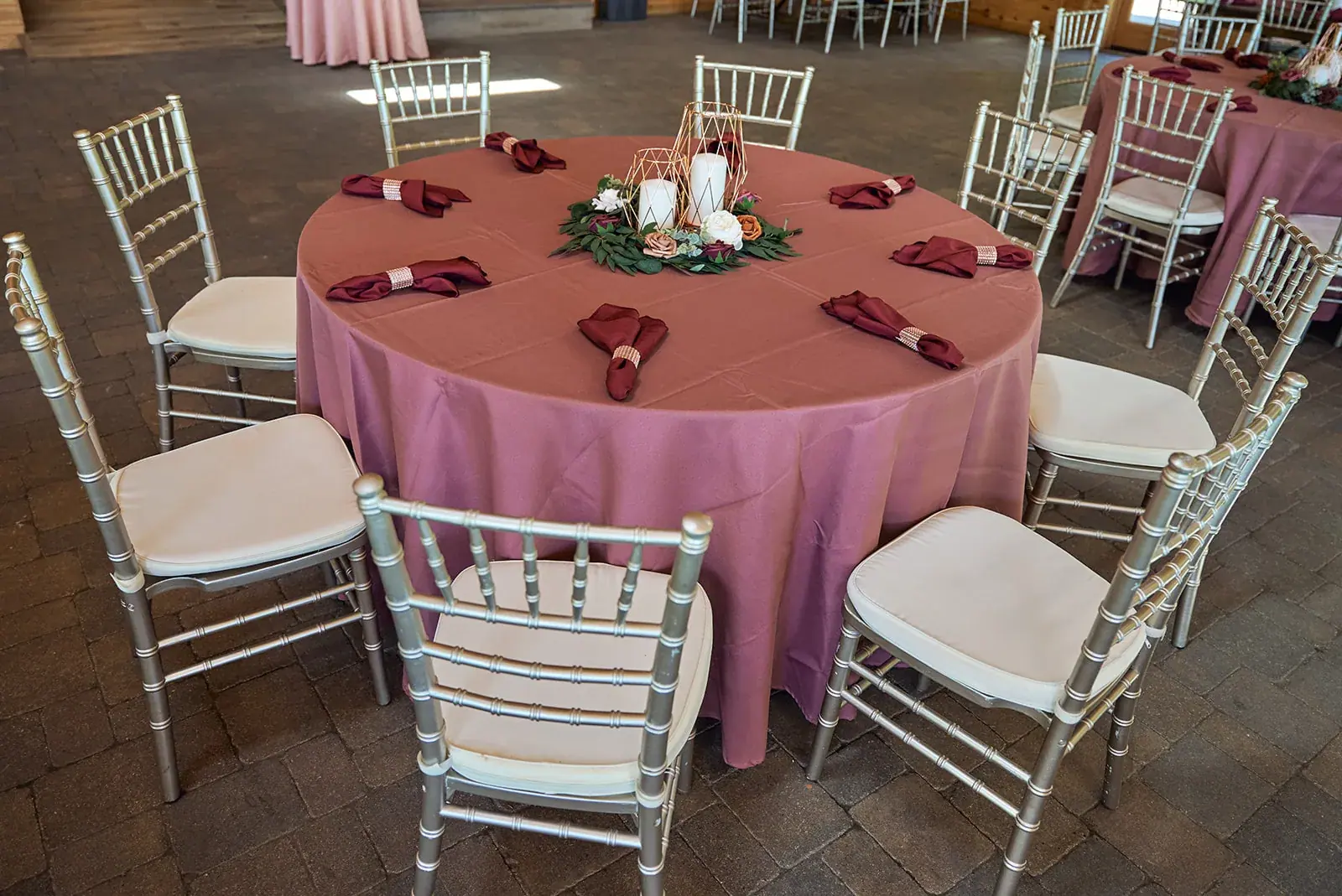 Reception table mauve linens — Jess & Bryce's wedding at The Manor at Fire Tower Hill, Lewiston
