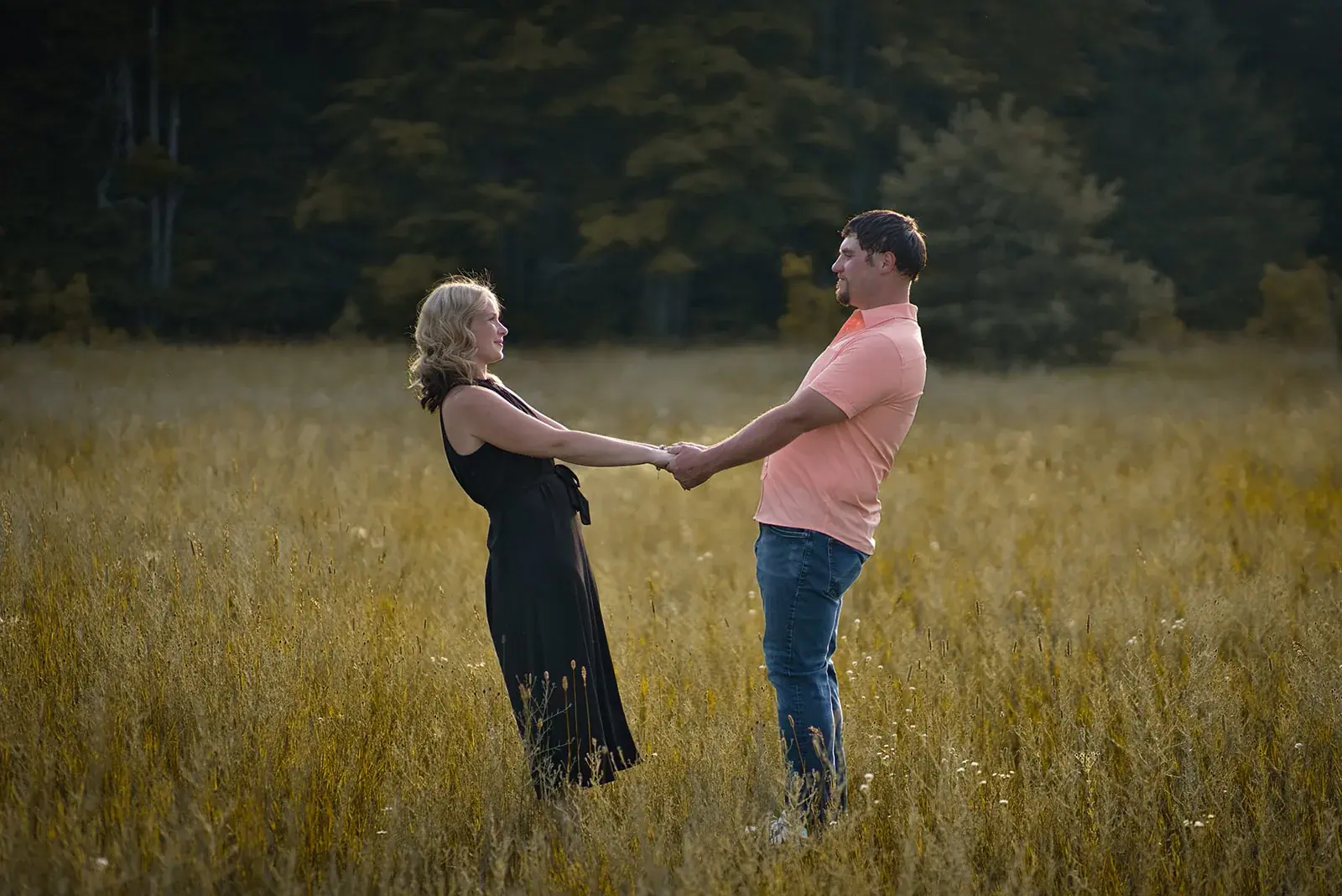 Holding hands meadow — Jess & Bryce's engagement session