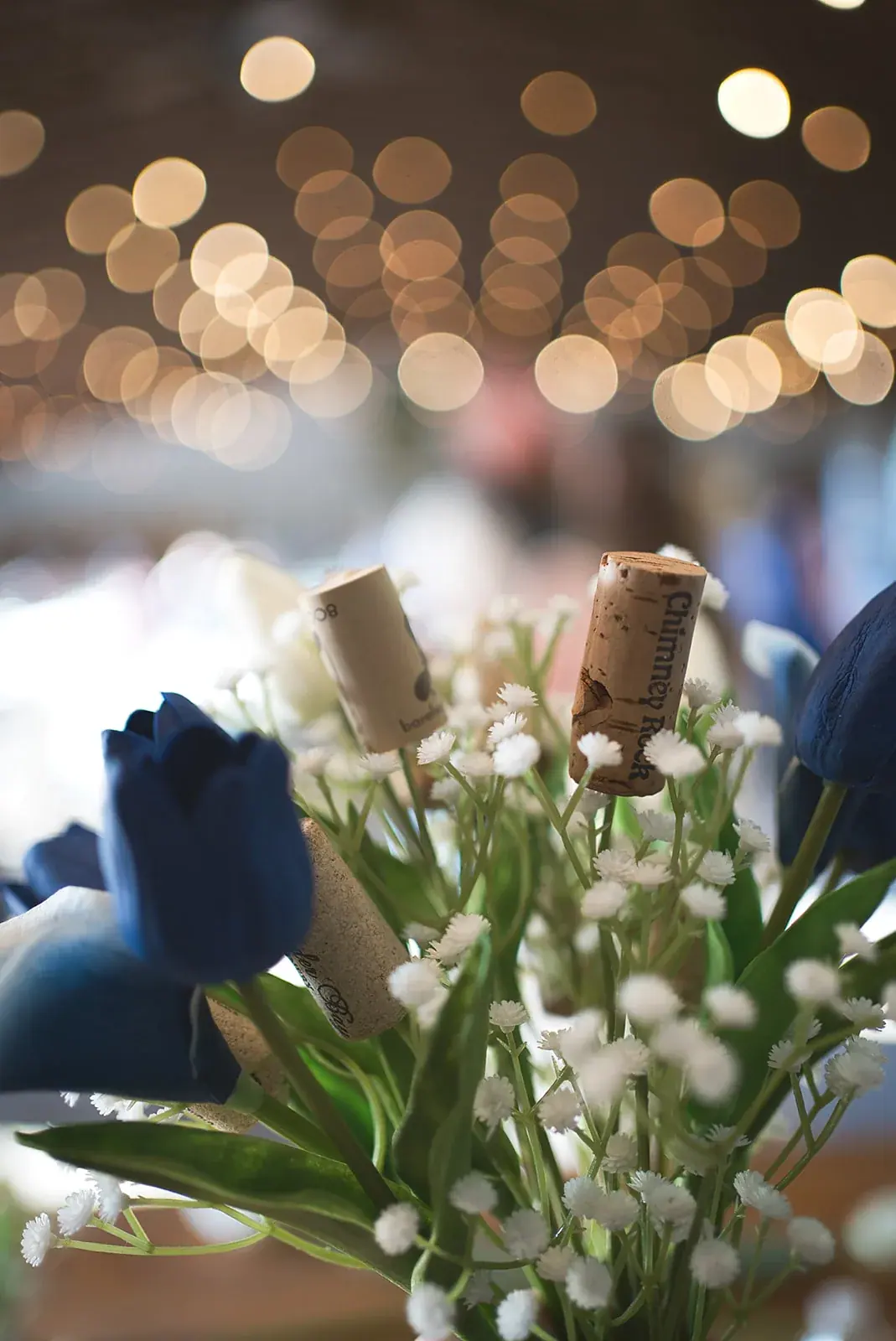 Bouquet bokeh detail — Kayla & Robert's wedding at Mackinaw Trail Winery, Petoskey