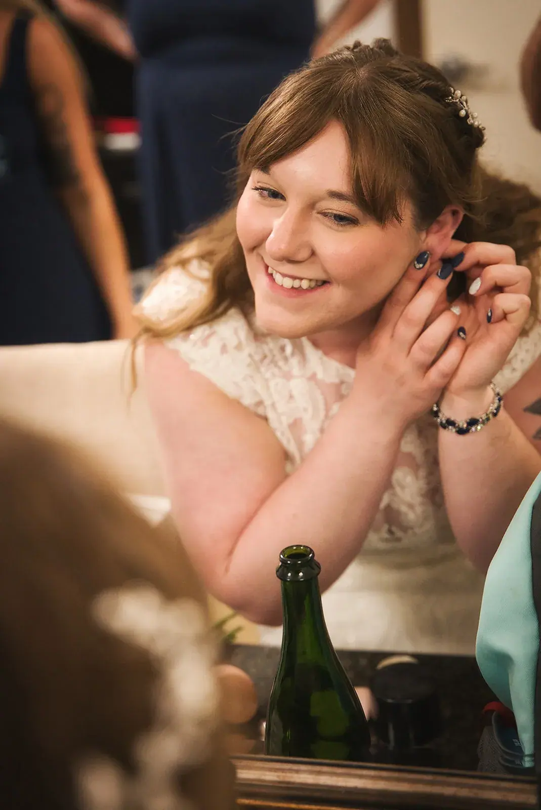 Bride getting ready smiling — Kayla & Robert's wedding at Mackinaw Trail Winery, Petoskey