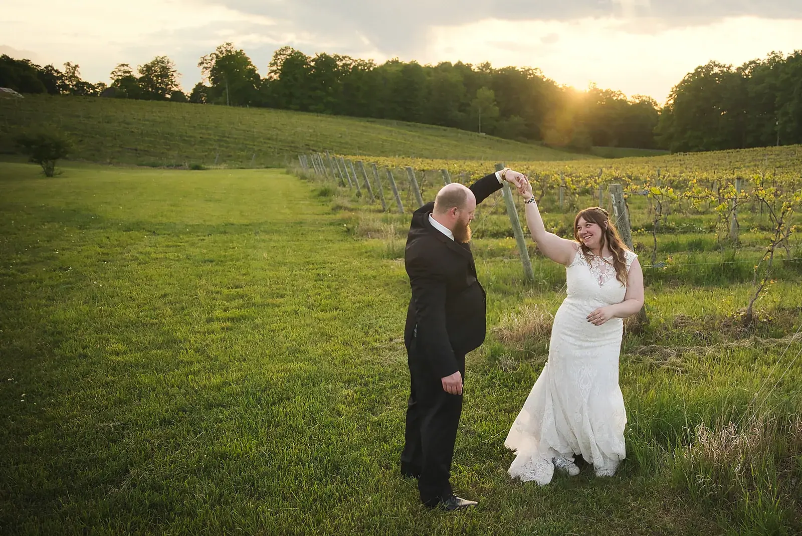 Bride and groom dancing vineyard — Kayla & Robert's wedding at Mackinaw Trail Winery, Petoskey