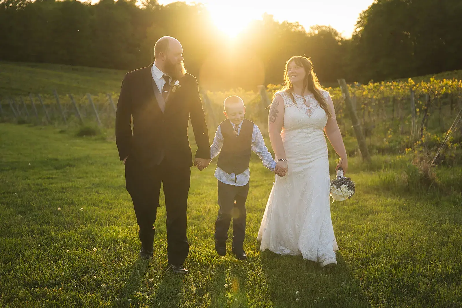 Bride and groom son sunset — Kayla & Robert's wedding at Mackinaw Trail Winery, Petoskey