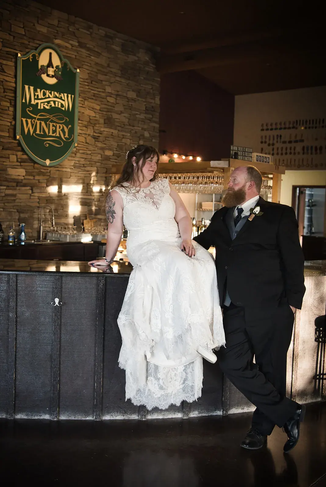 Bride and groom tasting room — Kayla & Robert's wedding at Mackinaw Trail Winery, Petoskey