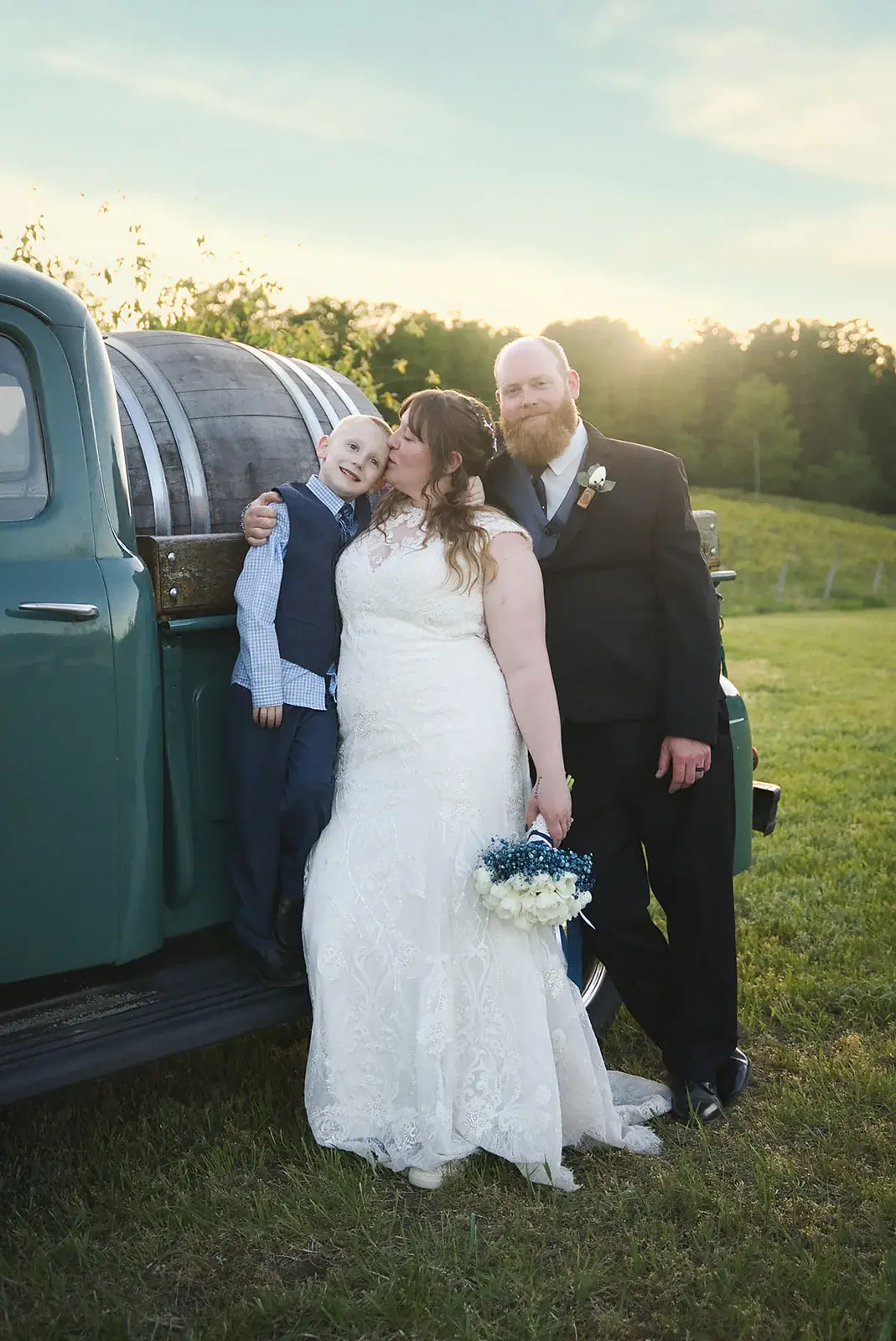 Bride and groom vintage truck — Kayla & Robert's wedding at Mackinaw Trail Winery, Petoskey