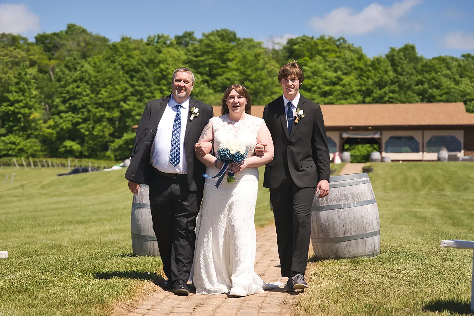 Bride processional — Kayla & Robert's wedding at Mackinaw Trail Winery, Petoskey