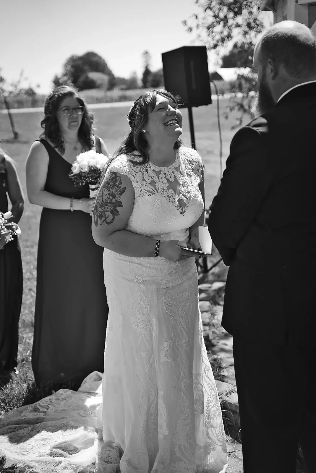 Ceremony in black and white — Kayla & Robert's wedding at Mackinaw Trail Winery, Petoskey